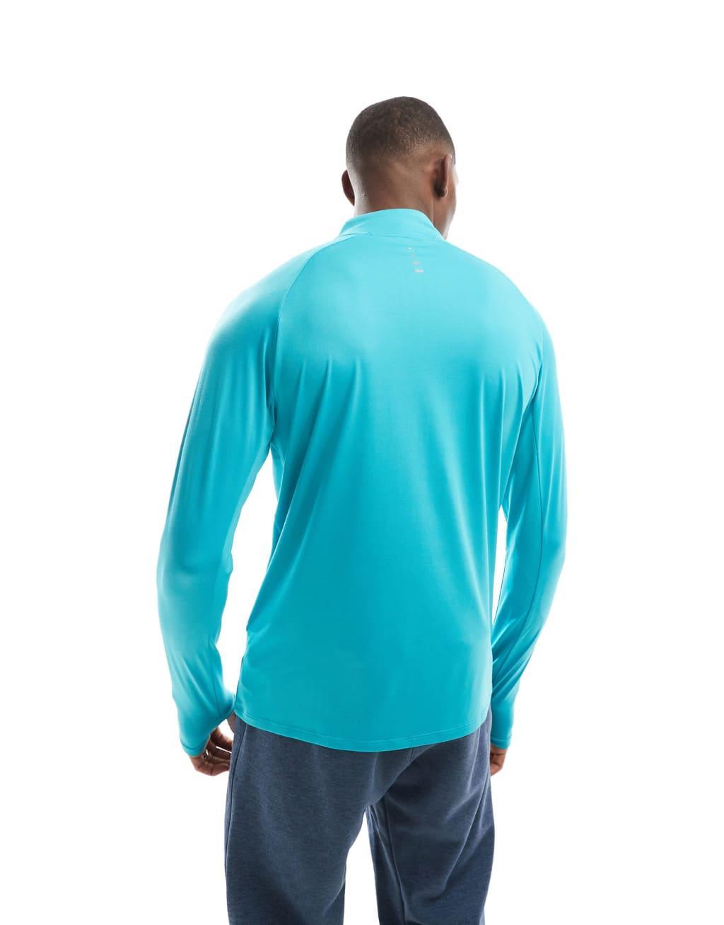 Nike Running Stride half zip sweatshirt in light blue Product Image