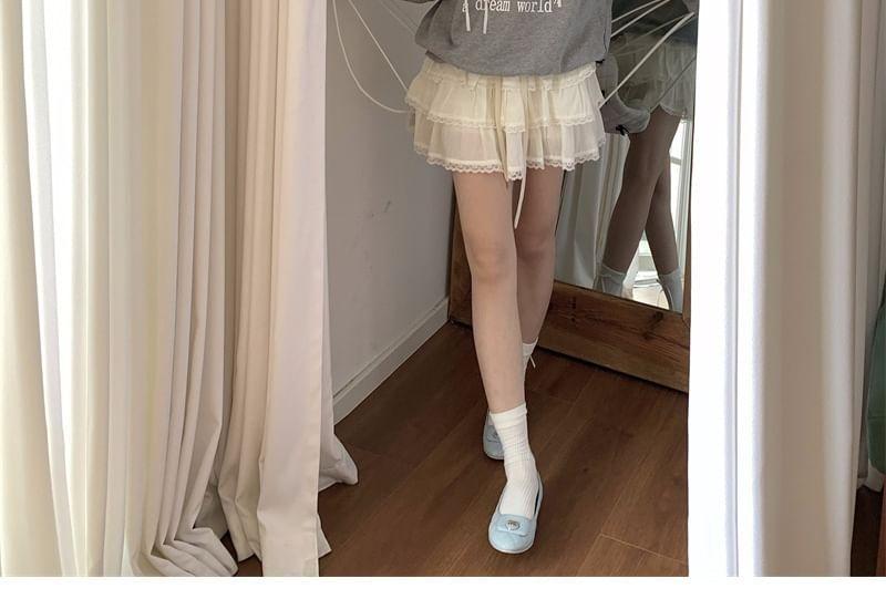 Round Neck Lettering Bow Cutout Sweatshirt Product Image