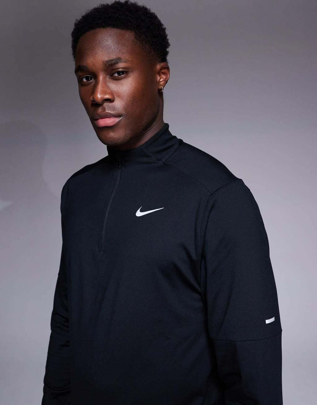 Nike Running DRI-FIT Element half zip sweatshirt in black  Product Image