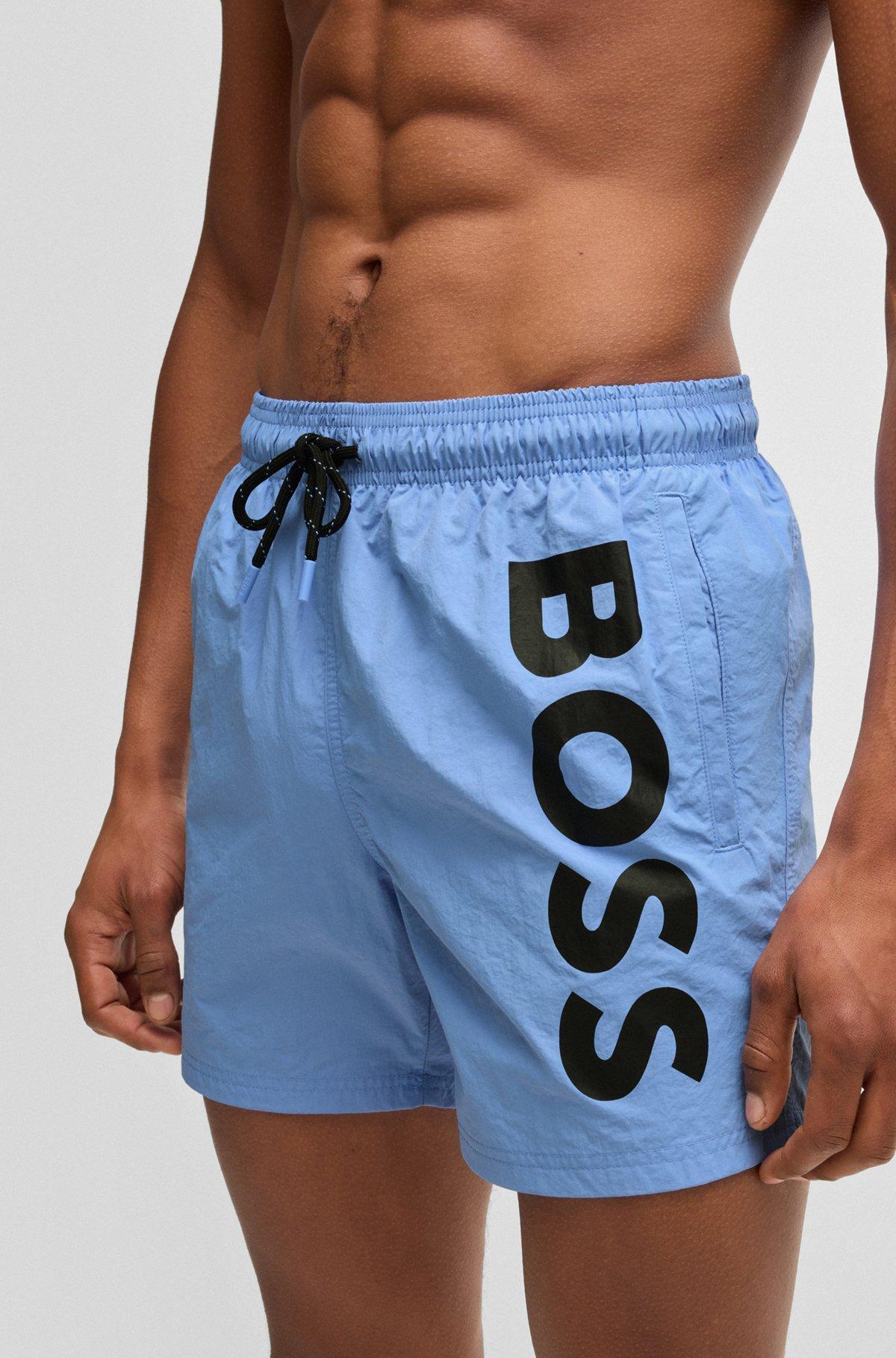 Fully lined swim shorts with logo print Product Image