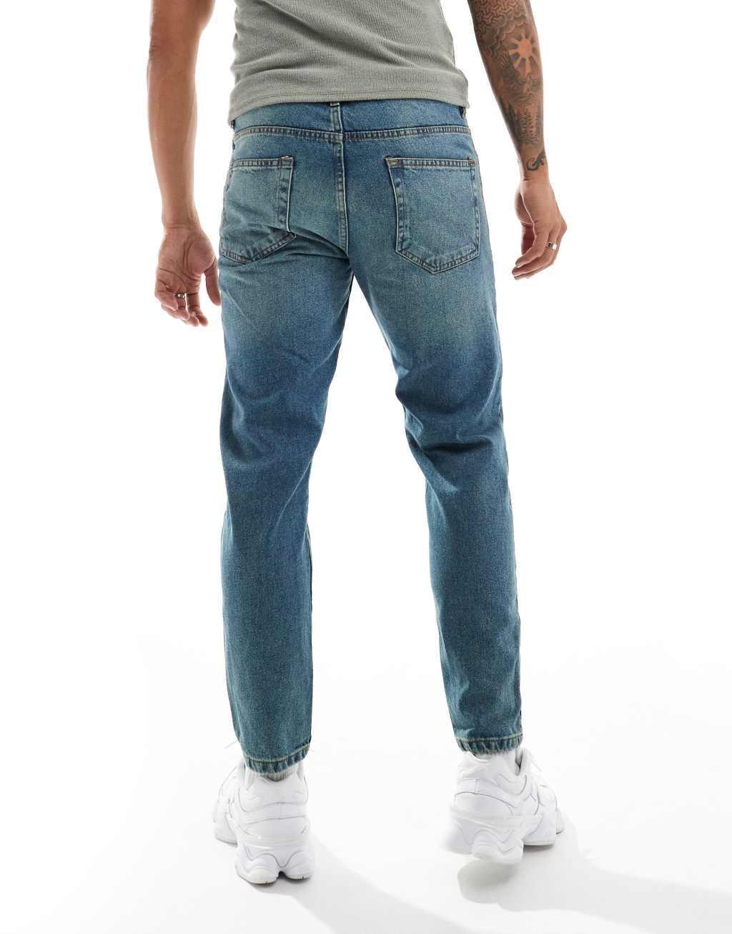 DTT rigid cropped tapered fit jeans in mid blue vintage tint Product Image