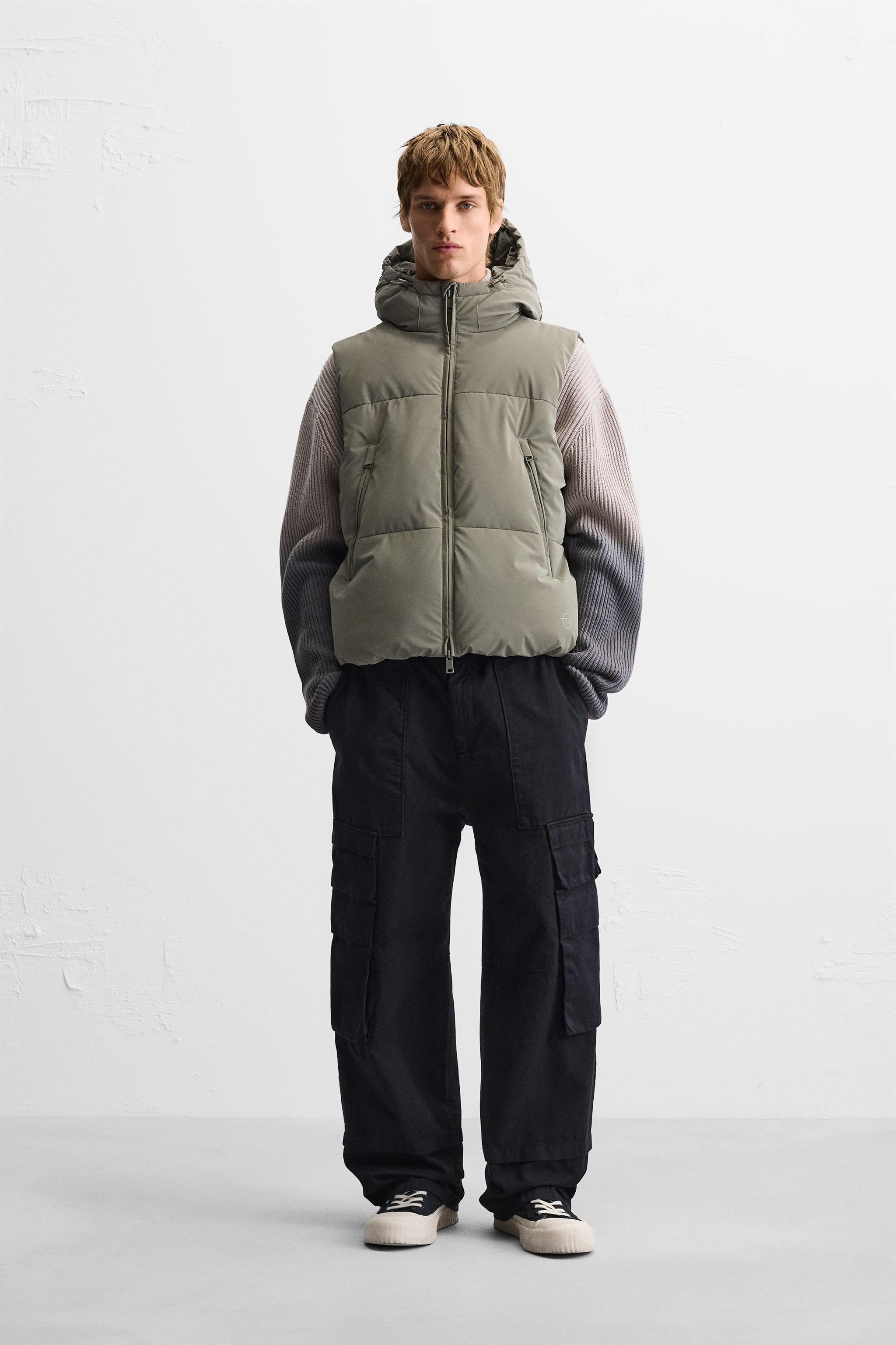 RUBBERIZED HOODED PUFFER VEST Product Image