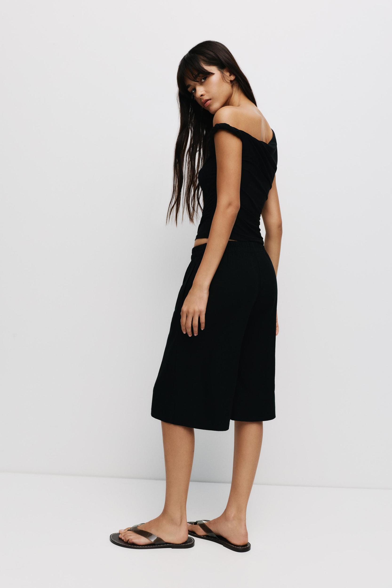 Asymmetric top Product Image