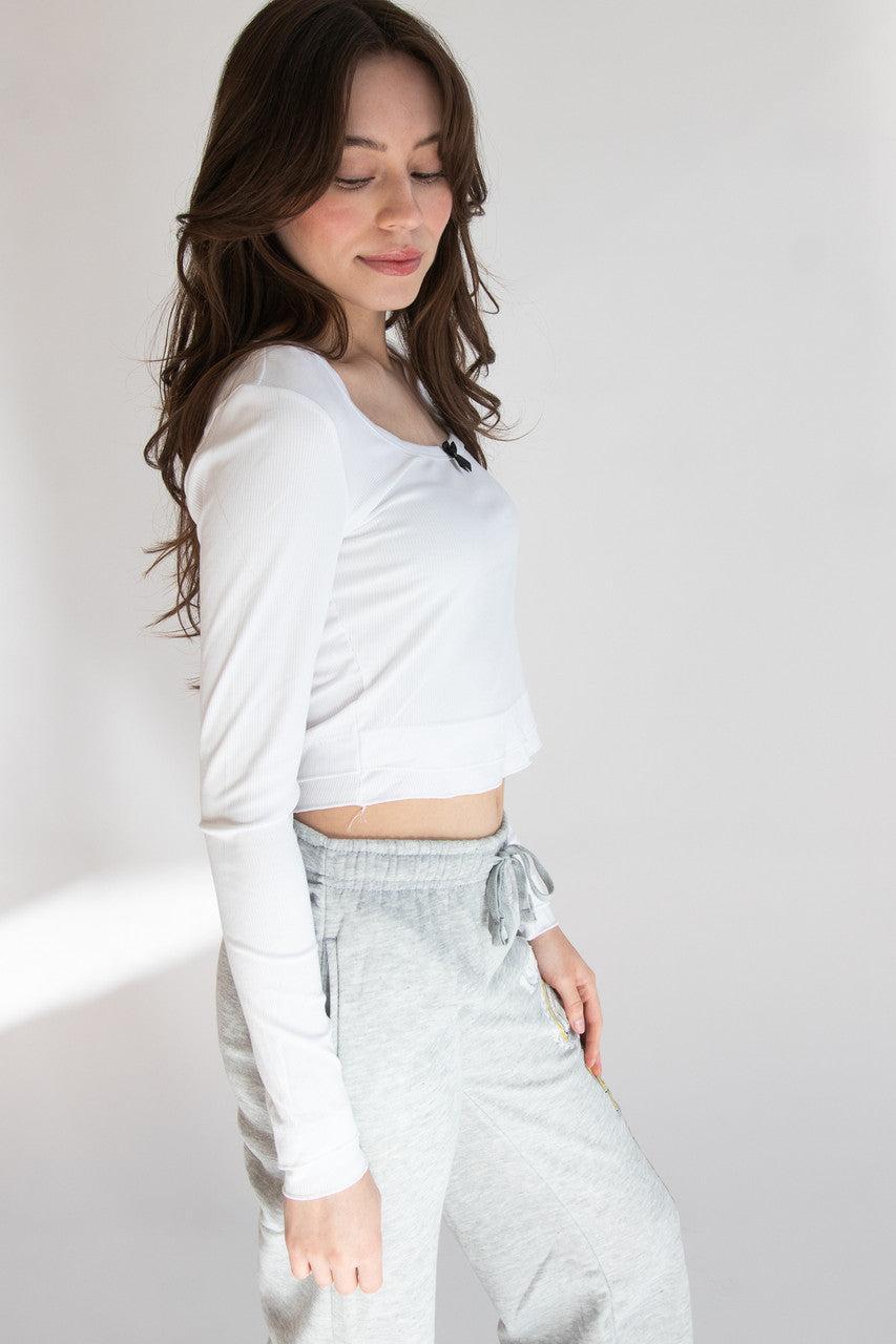 Layered Hem Bow Detail Long Sleeve Top Product Image