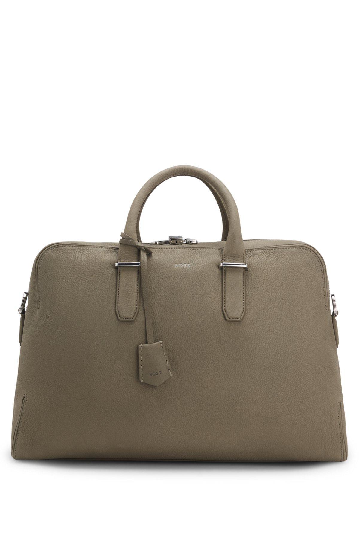 Grained-leather holdall with embossed logo Product Image