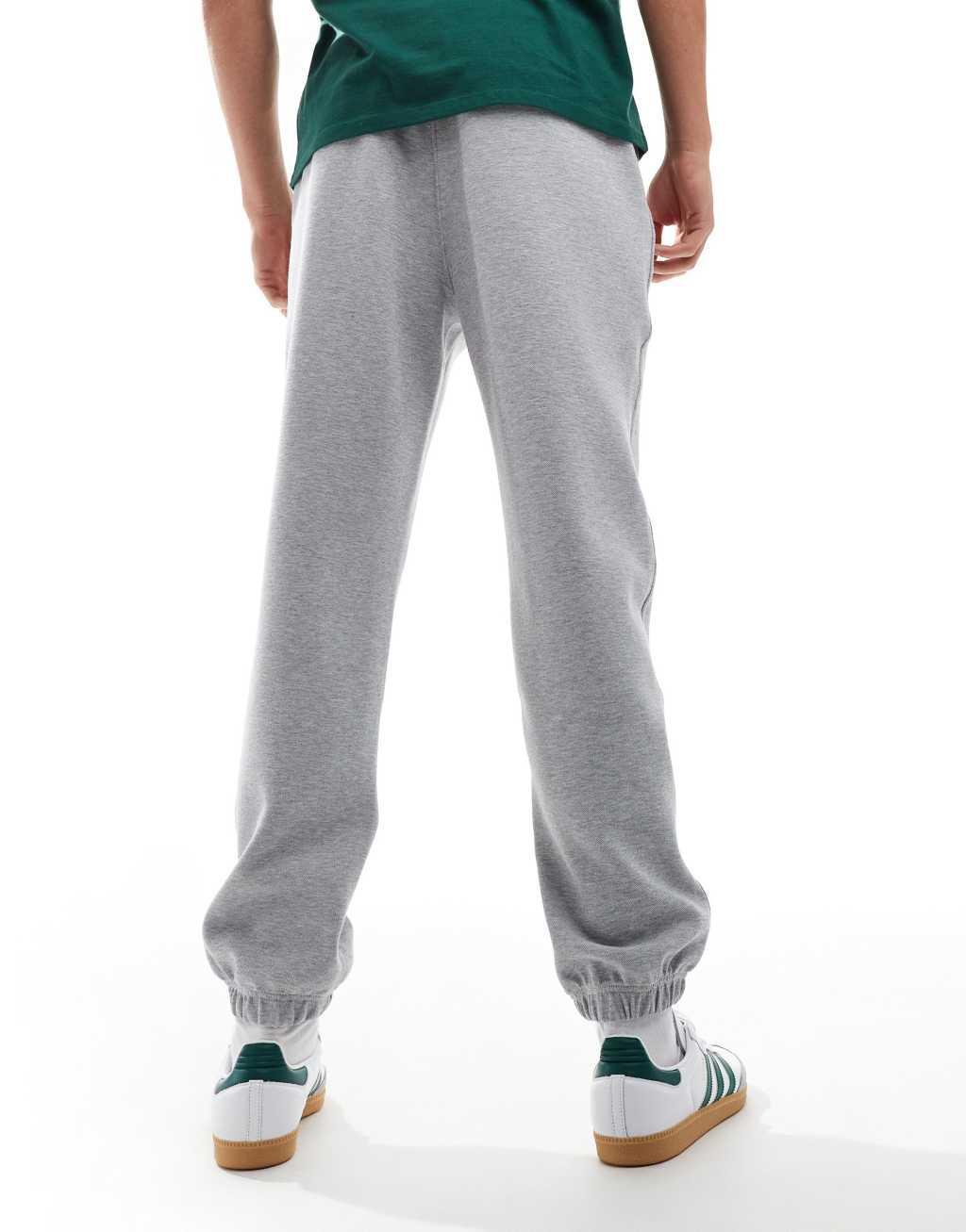 Lacoste logo sweatpants in gray Product Image