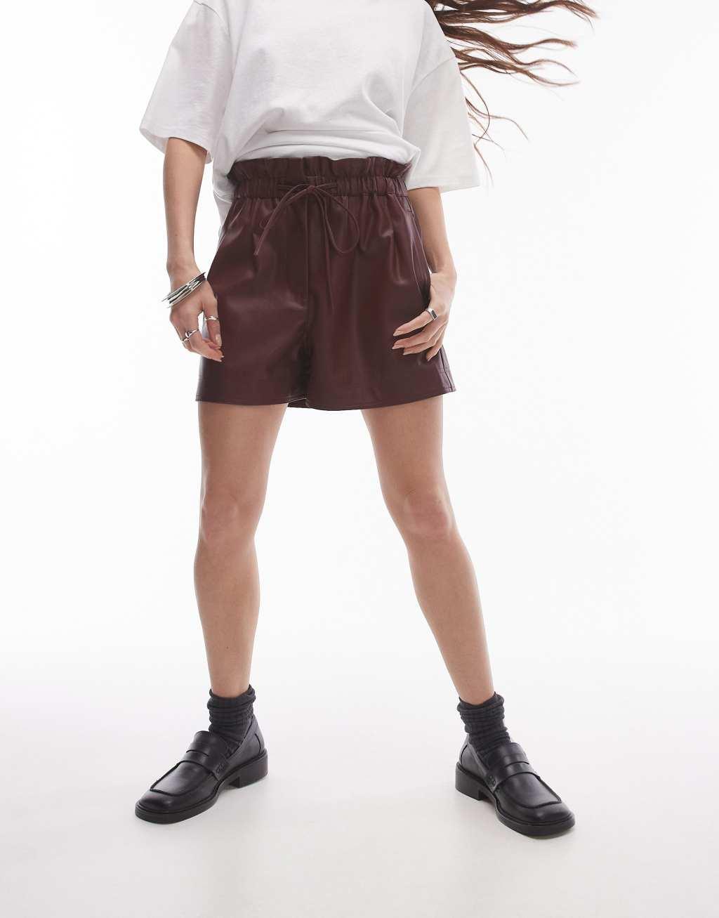 Topshop faux leather paperbag shorts in burgundy Product Image