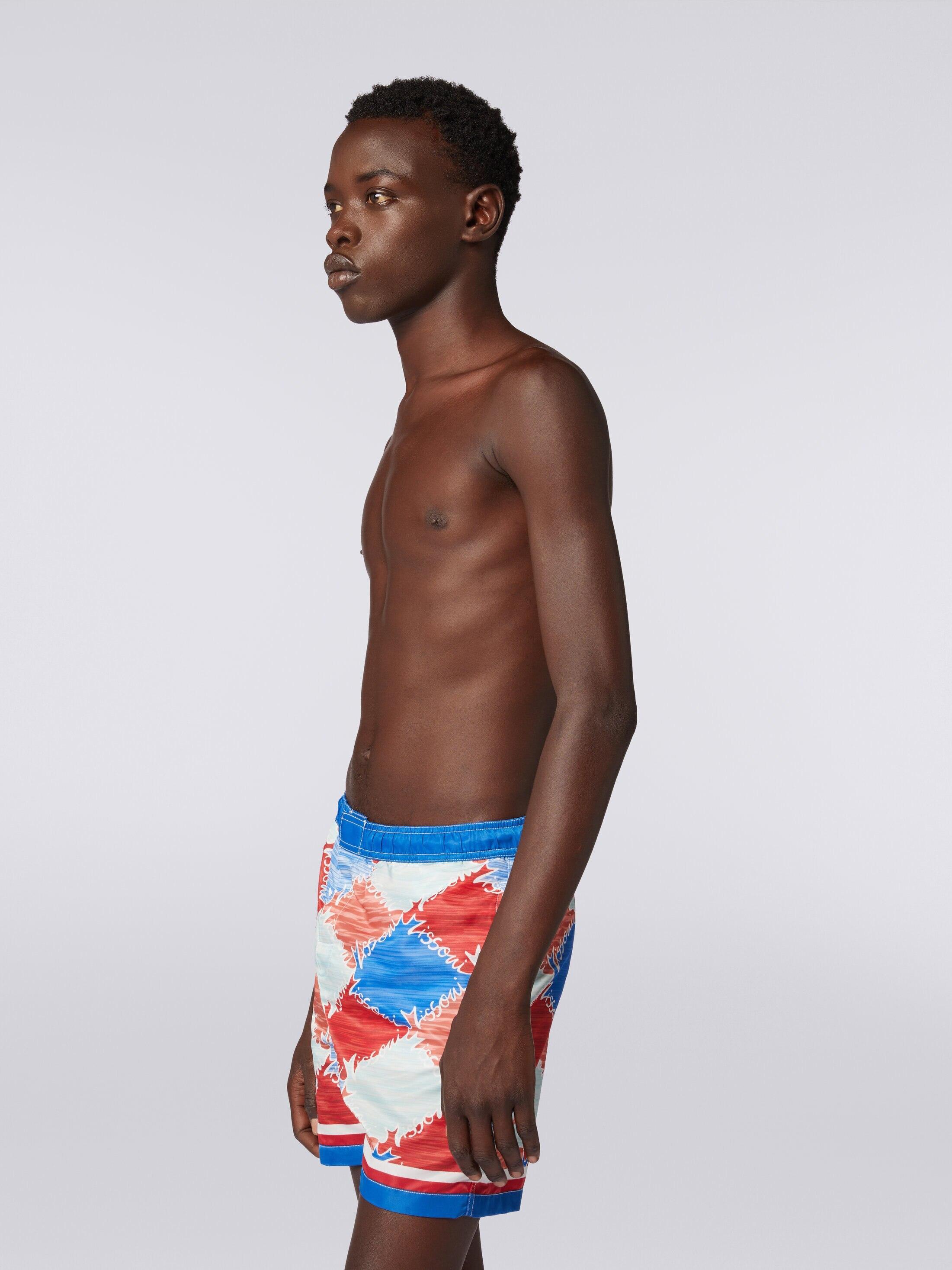 Swimming trunks in slub nylon with logo print Product Image