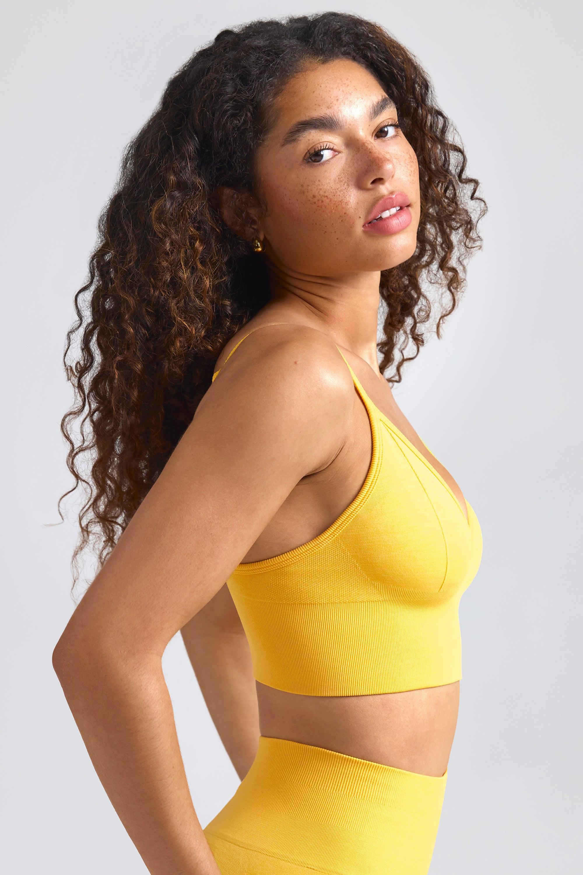 Define Luxe V-Neck Sports Bra in Golden Yellow Female Product Image