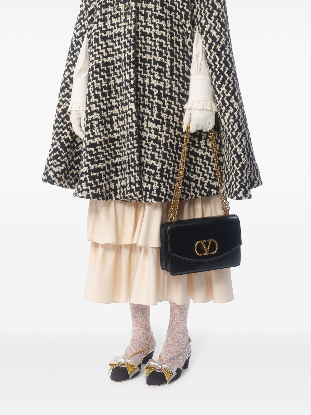 Geometric tweed cape Product Image