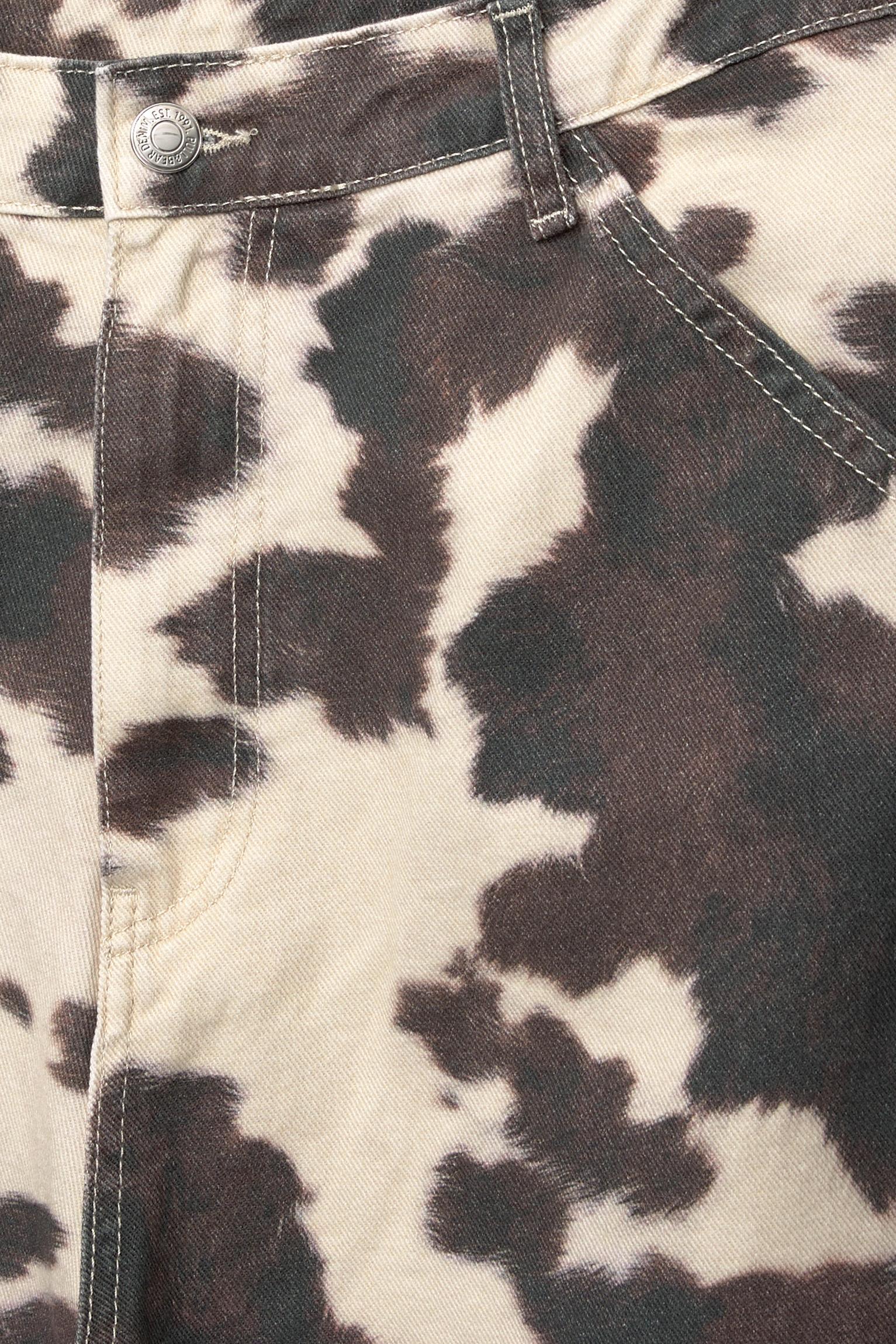 Animal print cow baggy Bermuda shorts Product Image