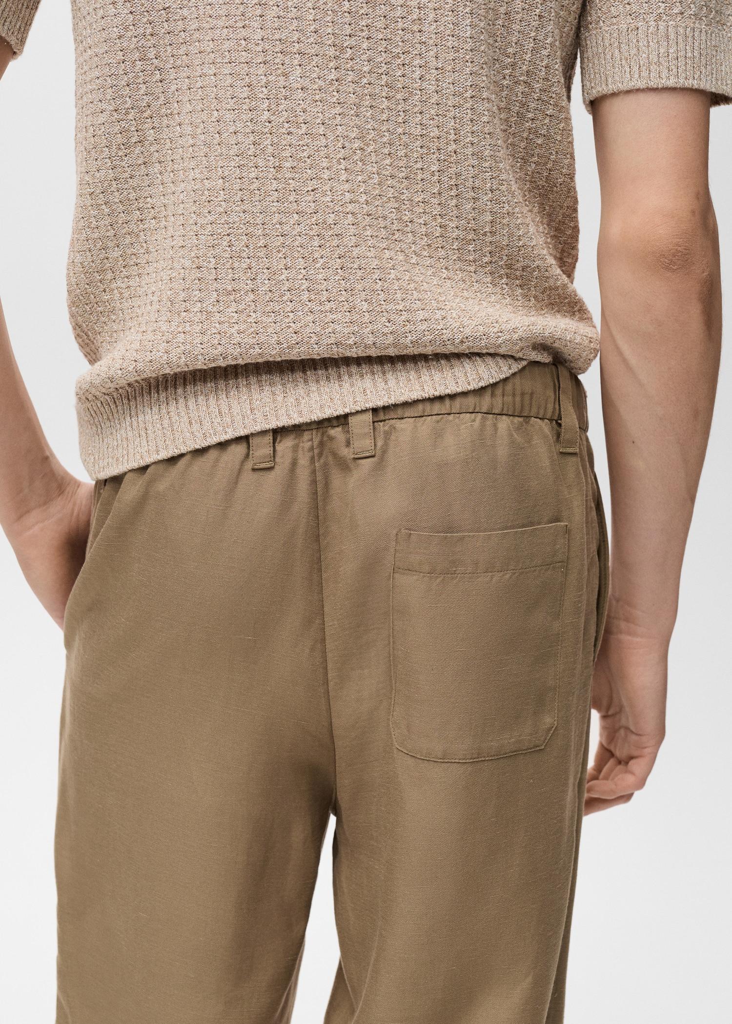 Linen-blend pants with an elastic waistband - Men | MANGO USA Product Image
