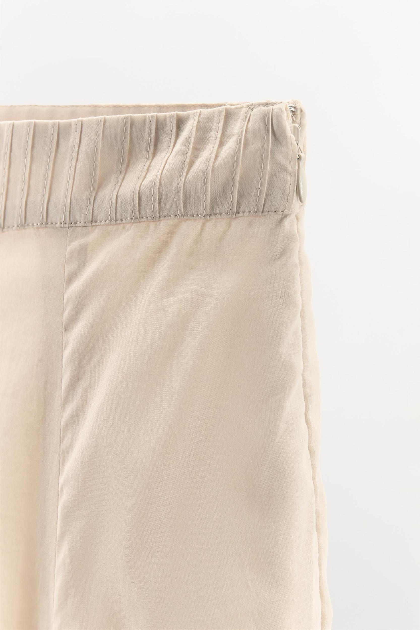 ASYMMETRIC PLEATED SKIRT Product Image