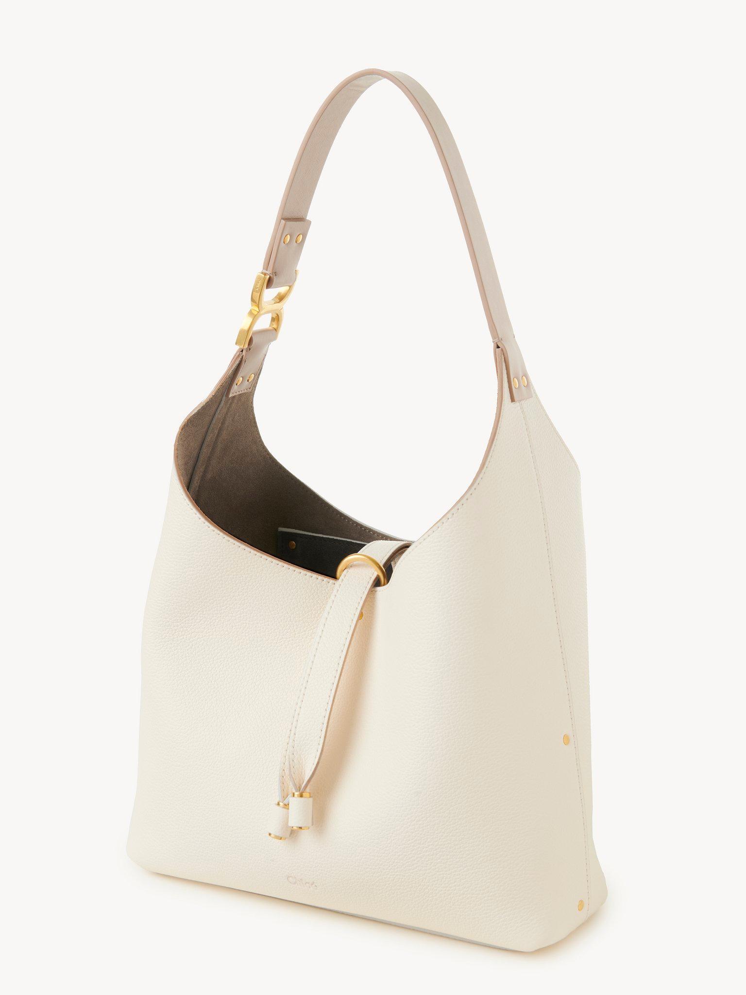 Small Marcie hobo bag in grained leather Product Image