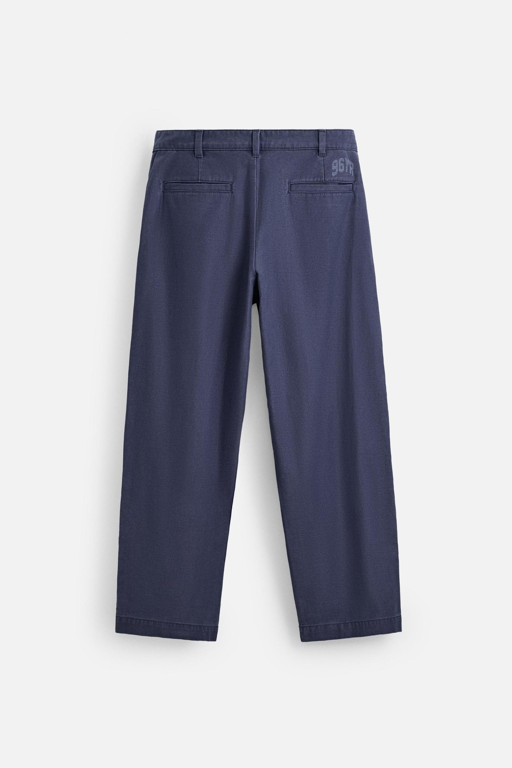 RELAXED FIT PLEATED JEANS Product Image
