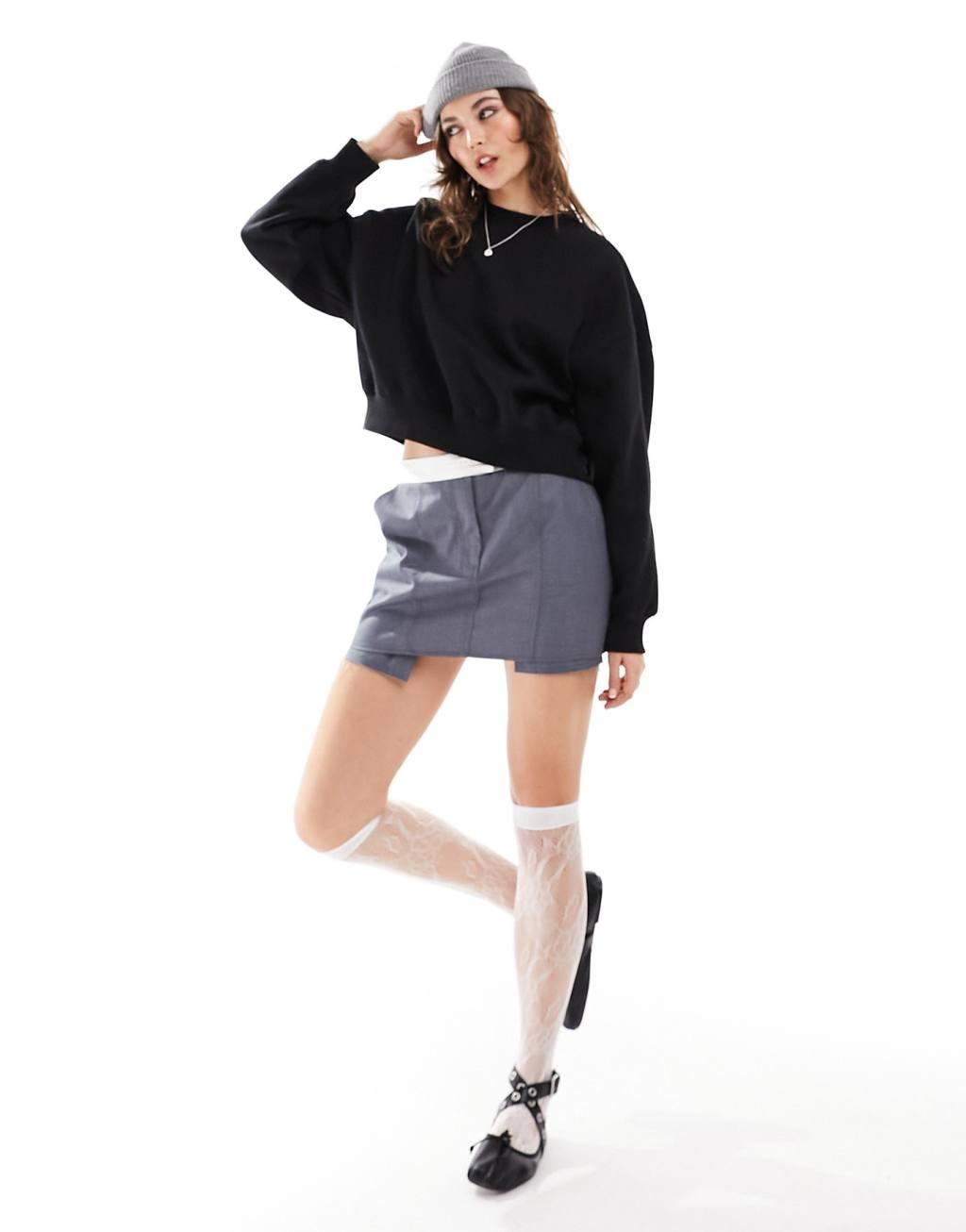 Monki round neck long sleeve sweatshirt in black Product Image