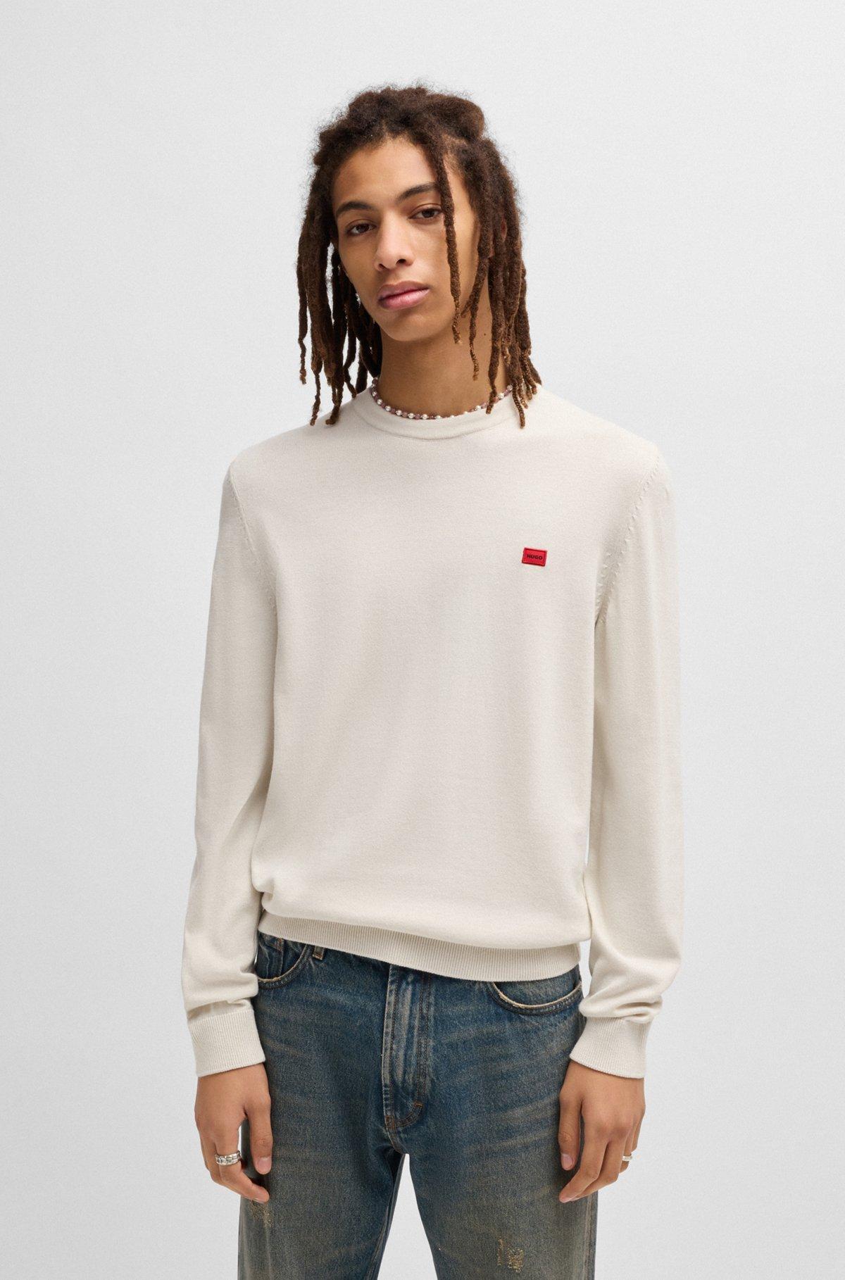 Cotton sweater with red logo label Product Image