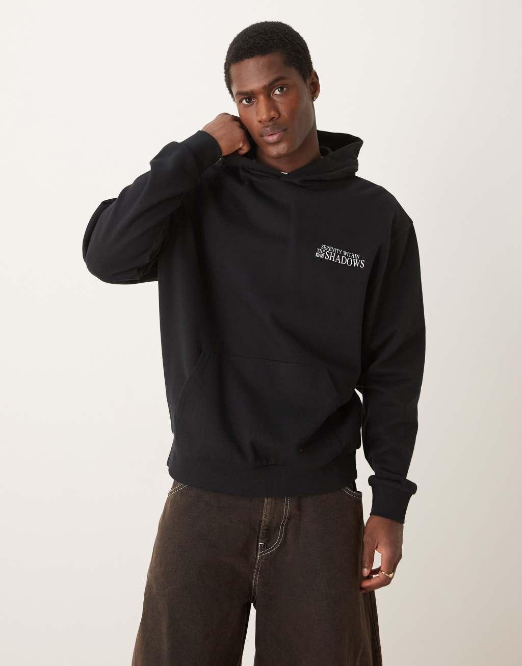 ASOS DESIGN oversized hoodie with monochrome print in black Product Image