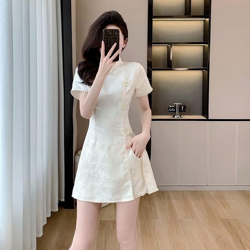 Set: Short-Sleeve Stand Collar Floral Top + High Waist Plain Shorts Product Image