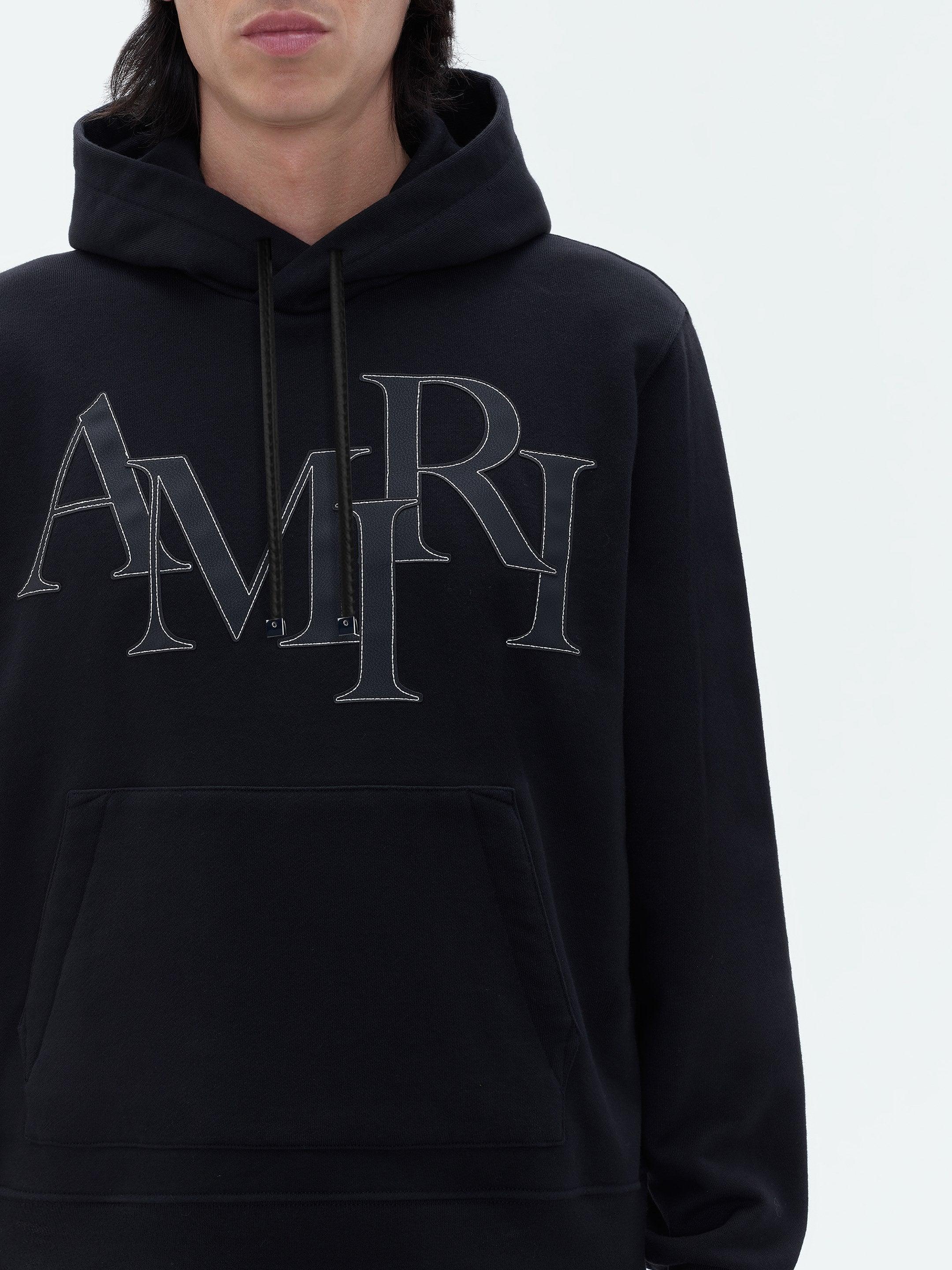 AMIRI STAGGERED LOGO HOODIE - Black Male Product Image