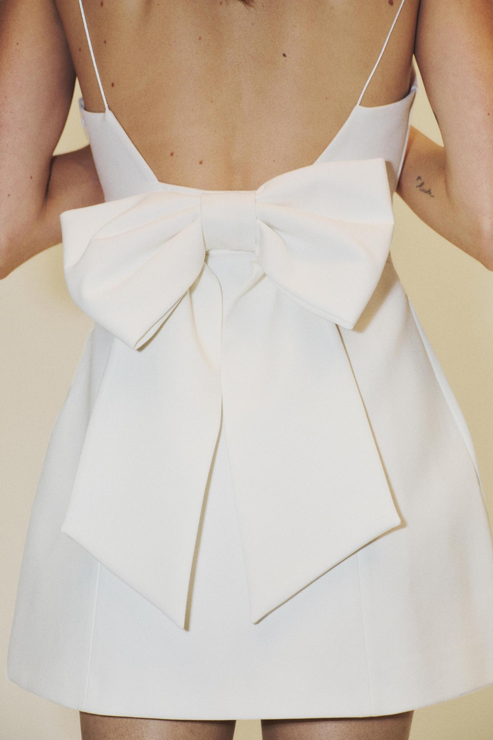 STRETCH SHORT BOW DRESS Product Image