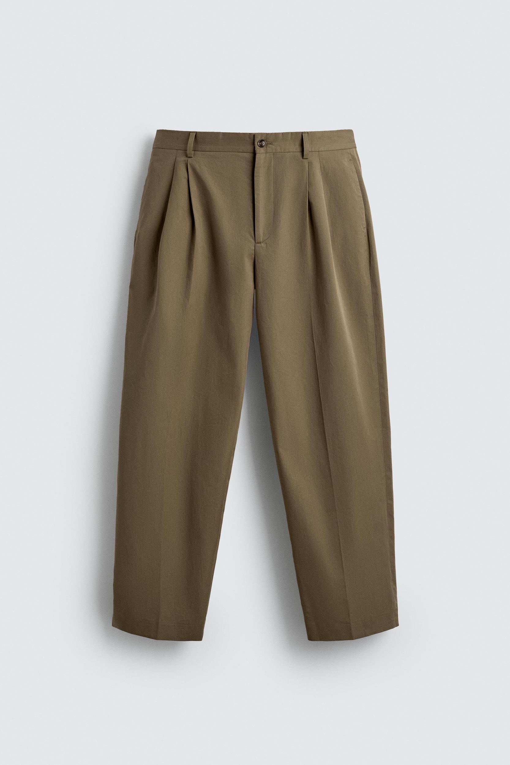 LIMITED EDITION RELAXED FIT PLEATED PANTS Product Image