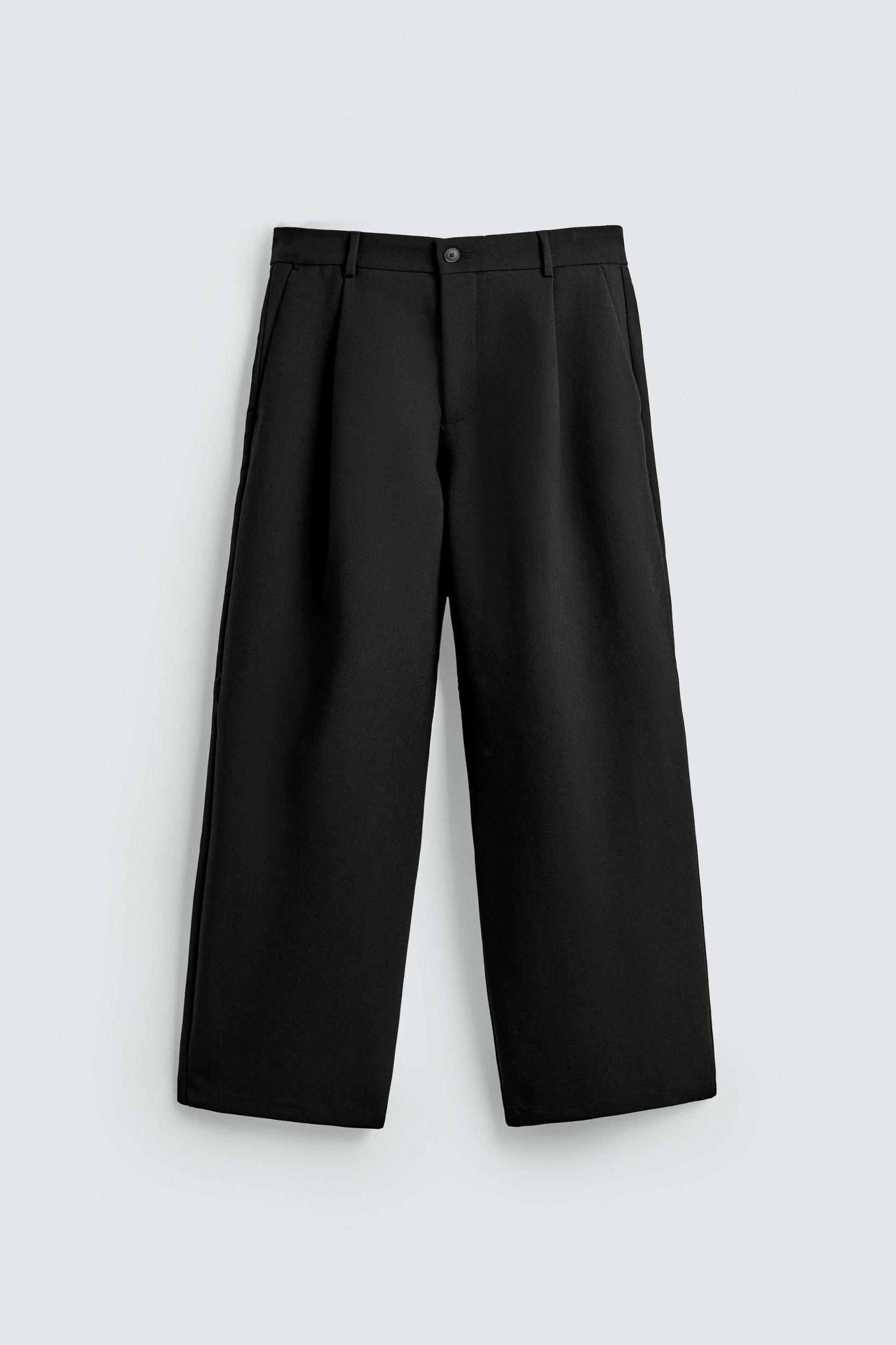 RELAXED FIT PLEATED PANTS Product Image