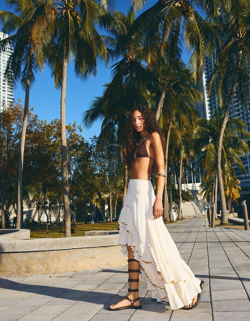 Asymmetric maxi skirt with textured lace trim Product Image