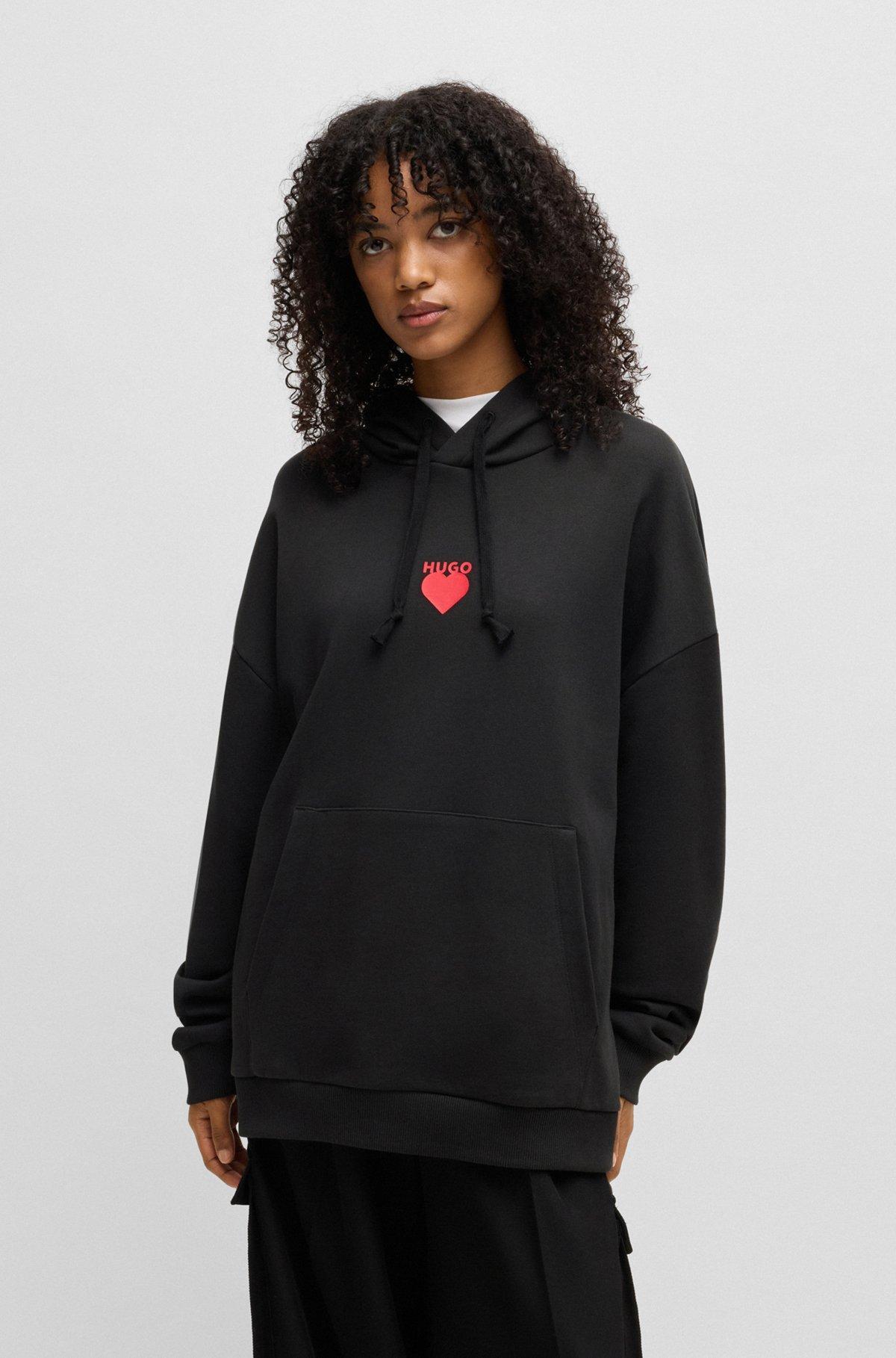 Cotton-terry hoodie with slogan and heart graphics Product Image