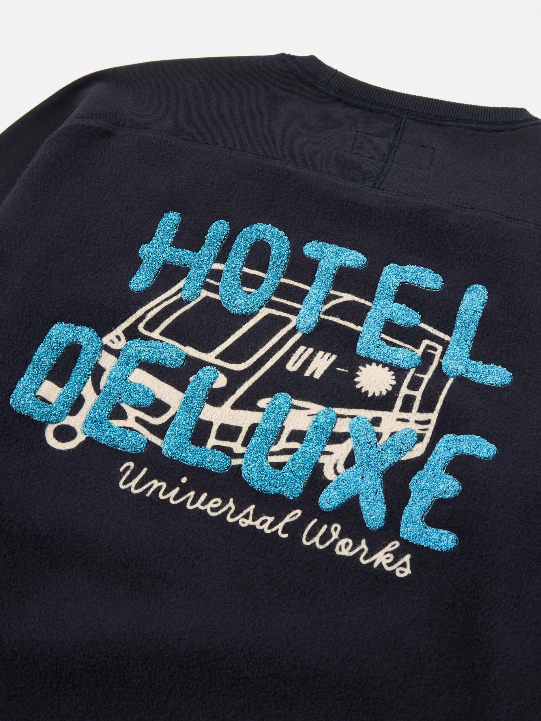 Universal Works Crew Sweat in Navy 'Hotel Deluxe' Embroidered Brush Back Product Image