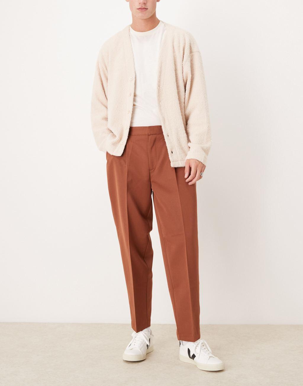 ASOS DESIGN oversized tapered dress pants with front pleat in rust Product Image