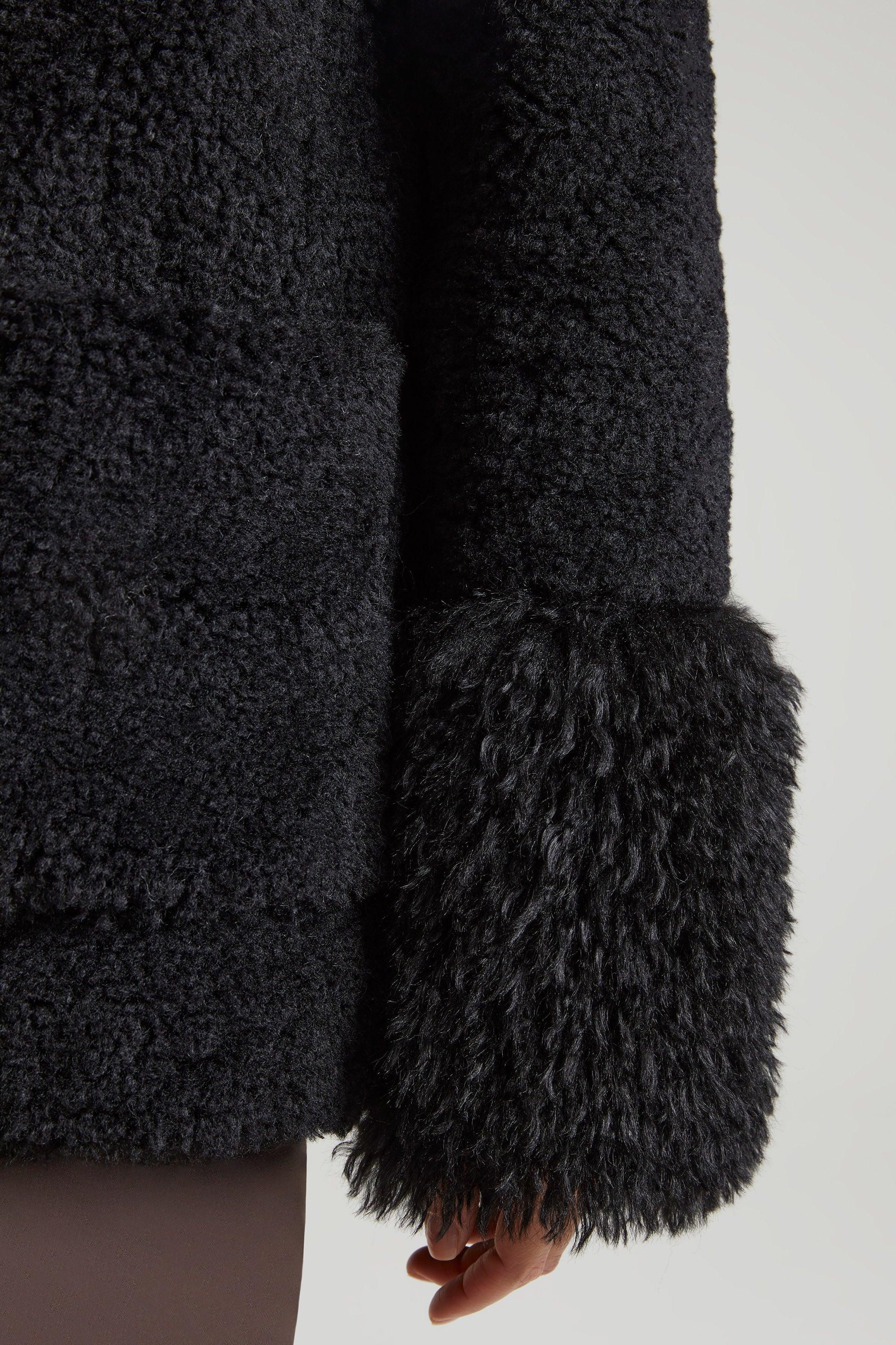 Shearling Coat with Large Front Pockets in Black Product Image