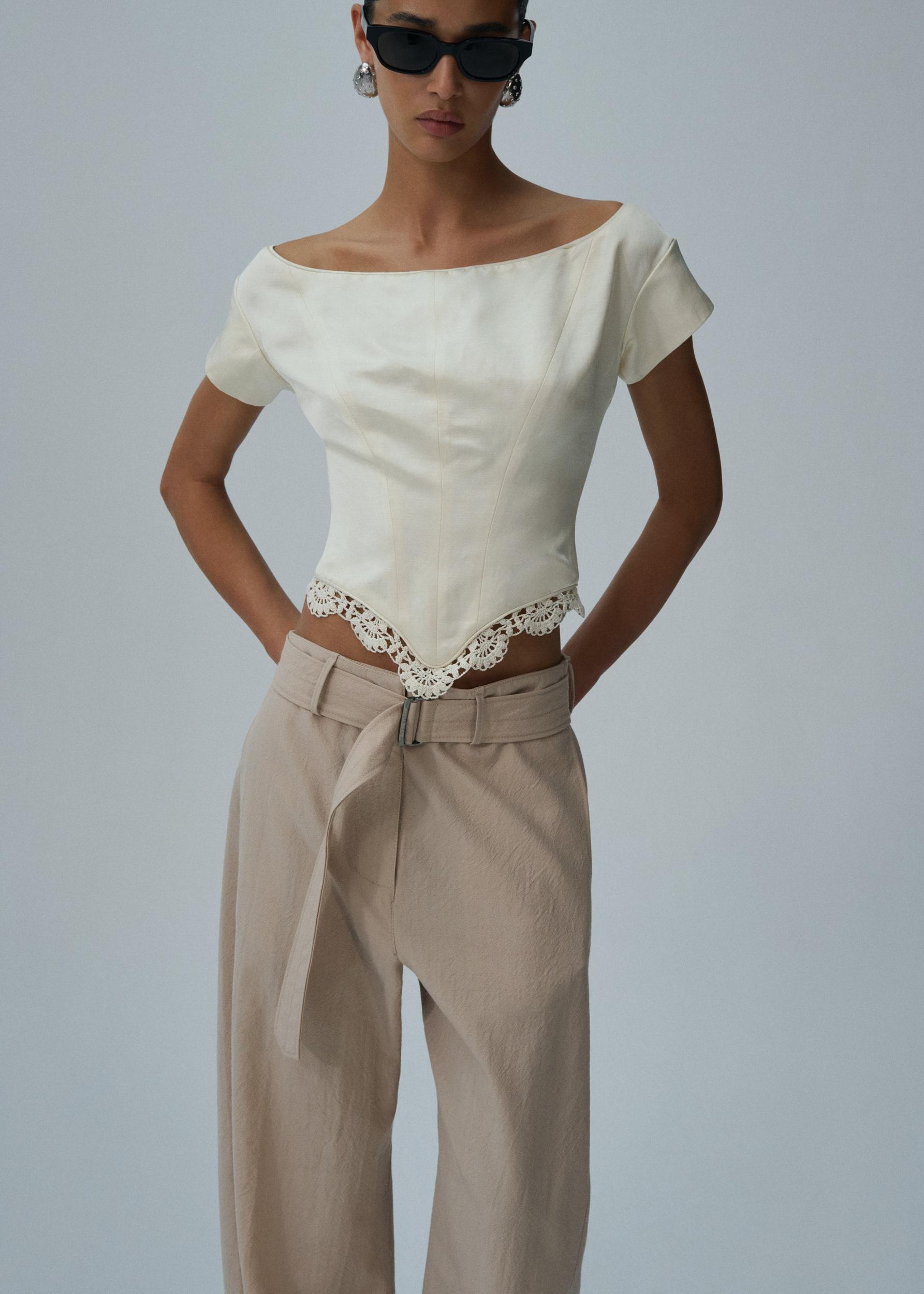 Lace trim short sleeve corset top in cream Product Image