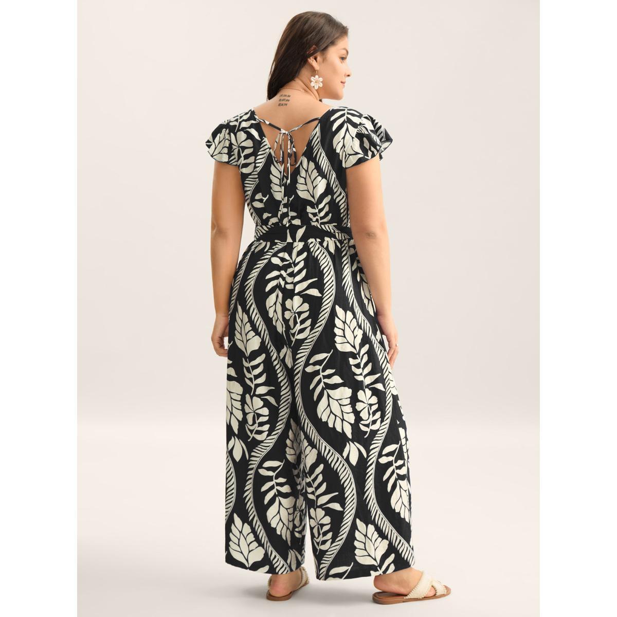 Plus Size Black Large Floral Print Pockets Jumpsuit Women Cap Sleeve Overlap Collar Vacation Loose Jumpsuits BloomChic 10/M Product Image