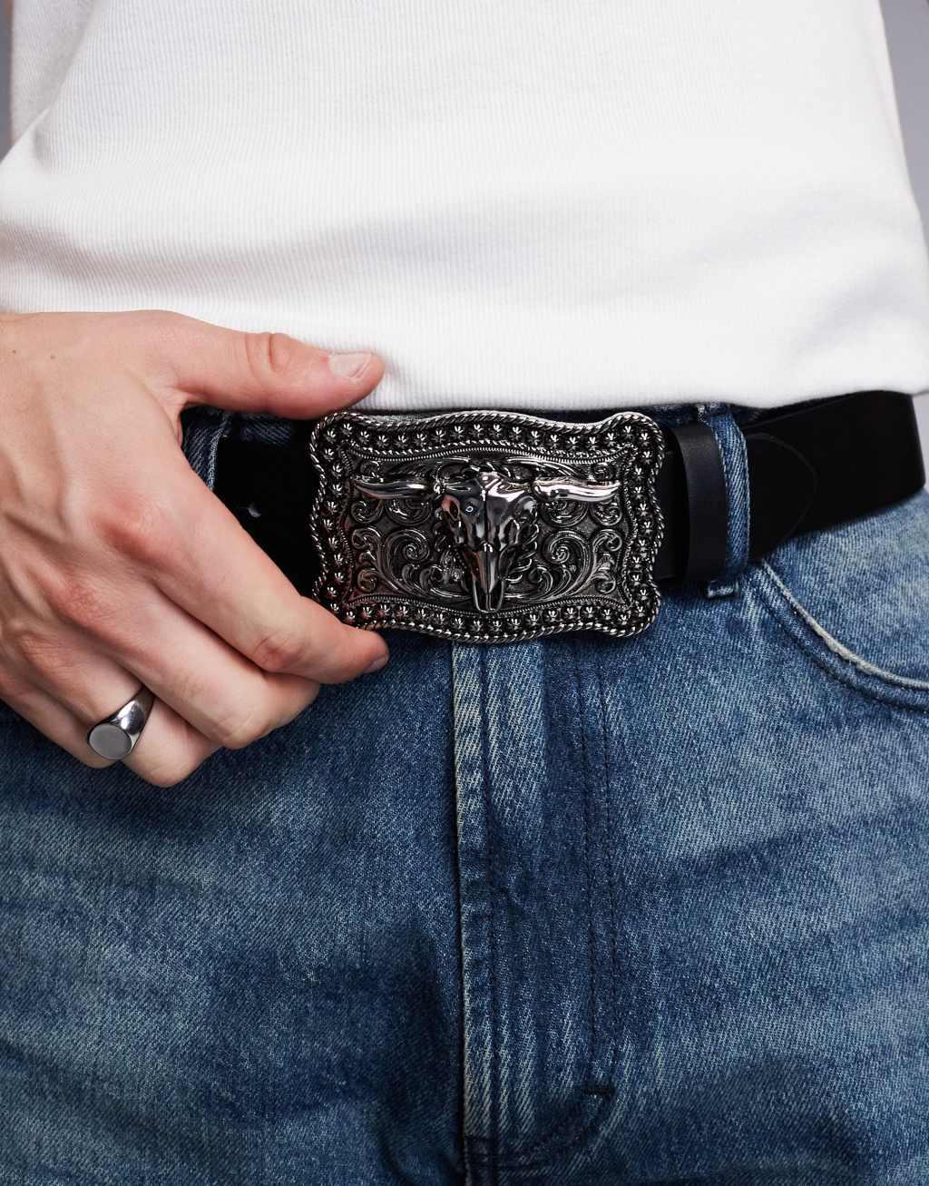 ASOS DESIGN faux leather belt with silver statement western buckle in black Product Image