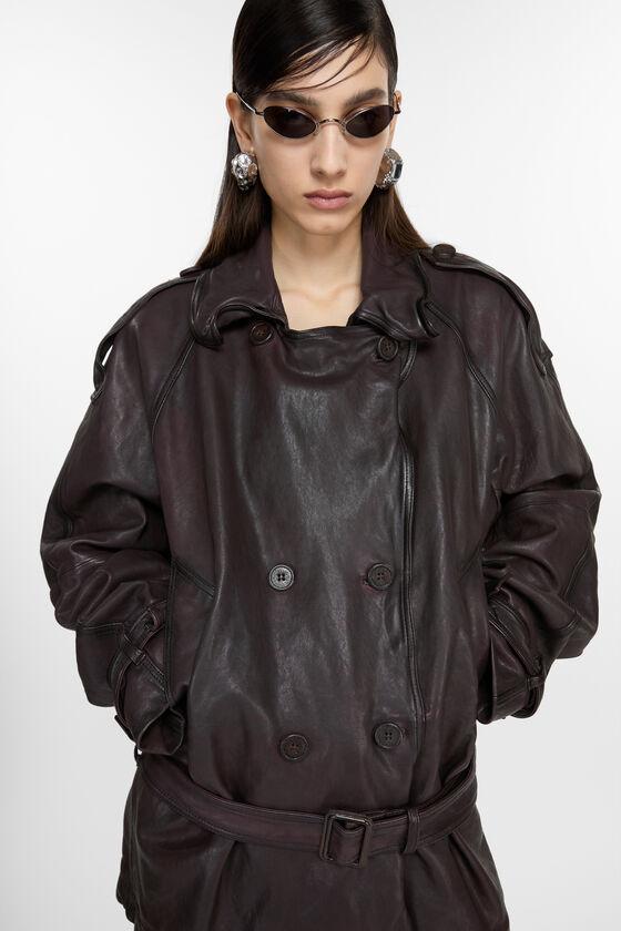 Belted leather jacket Product Image
