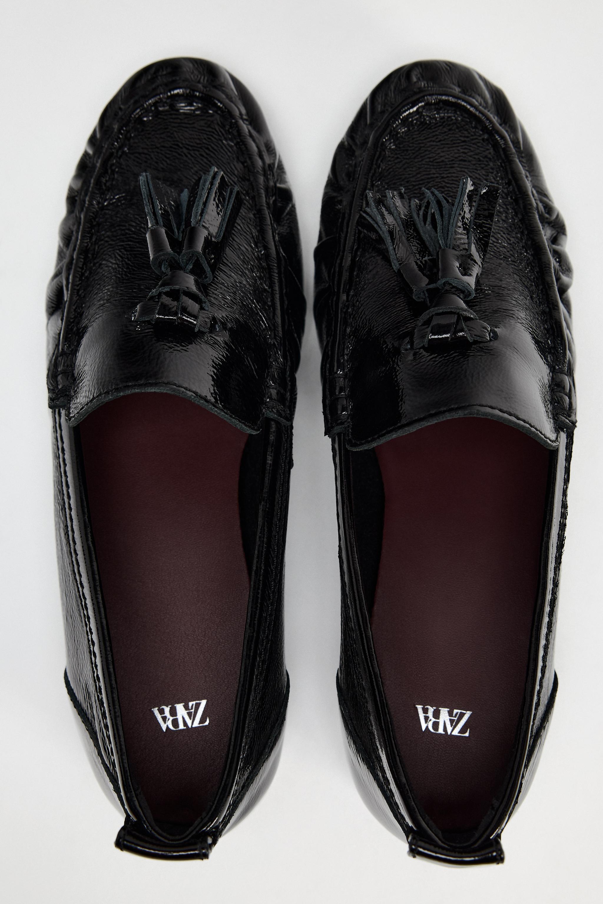 LEATHER TASSELED LOAFERS Product Image