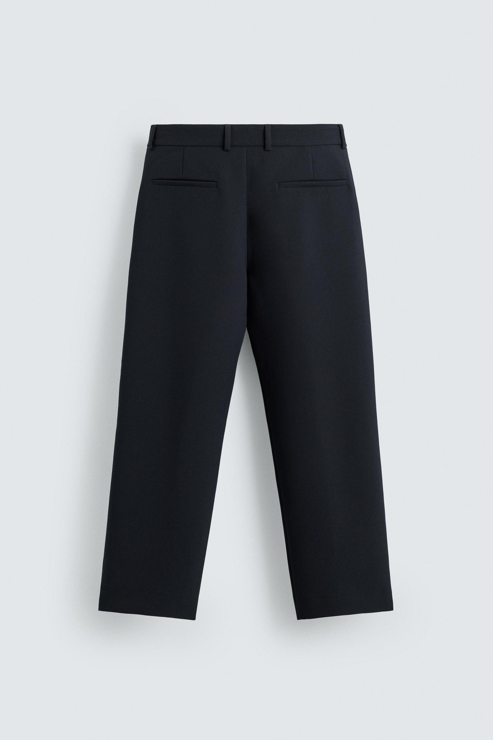 RELAXED FIT PLEATED PANTS Product Image