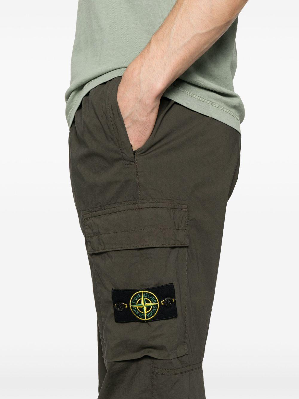Compass-badge trousers Product Image