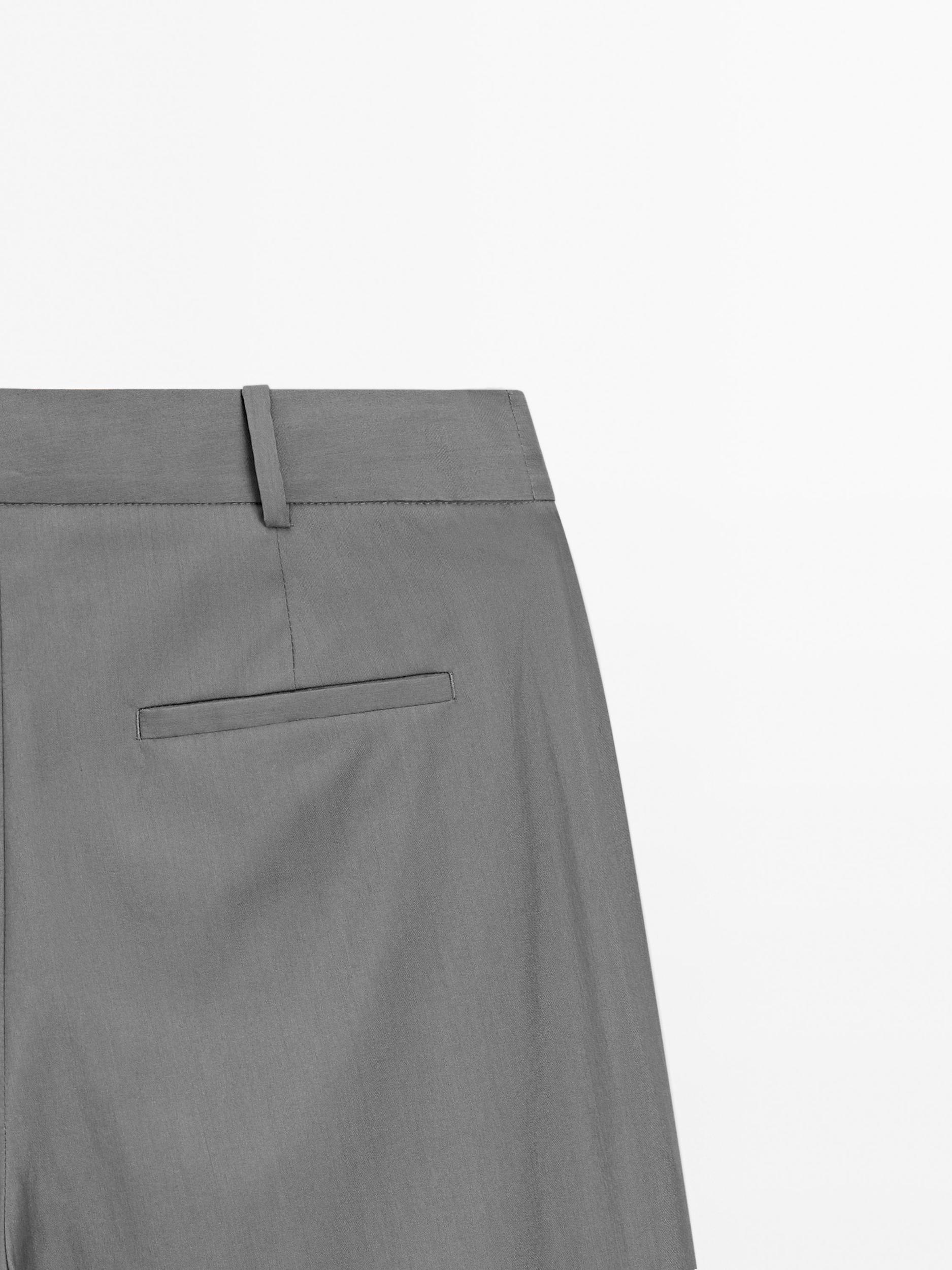 Flowing trousers with darts Product Image