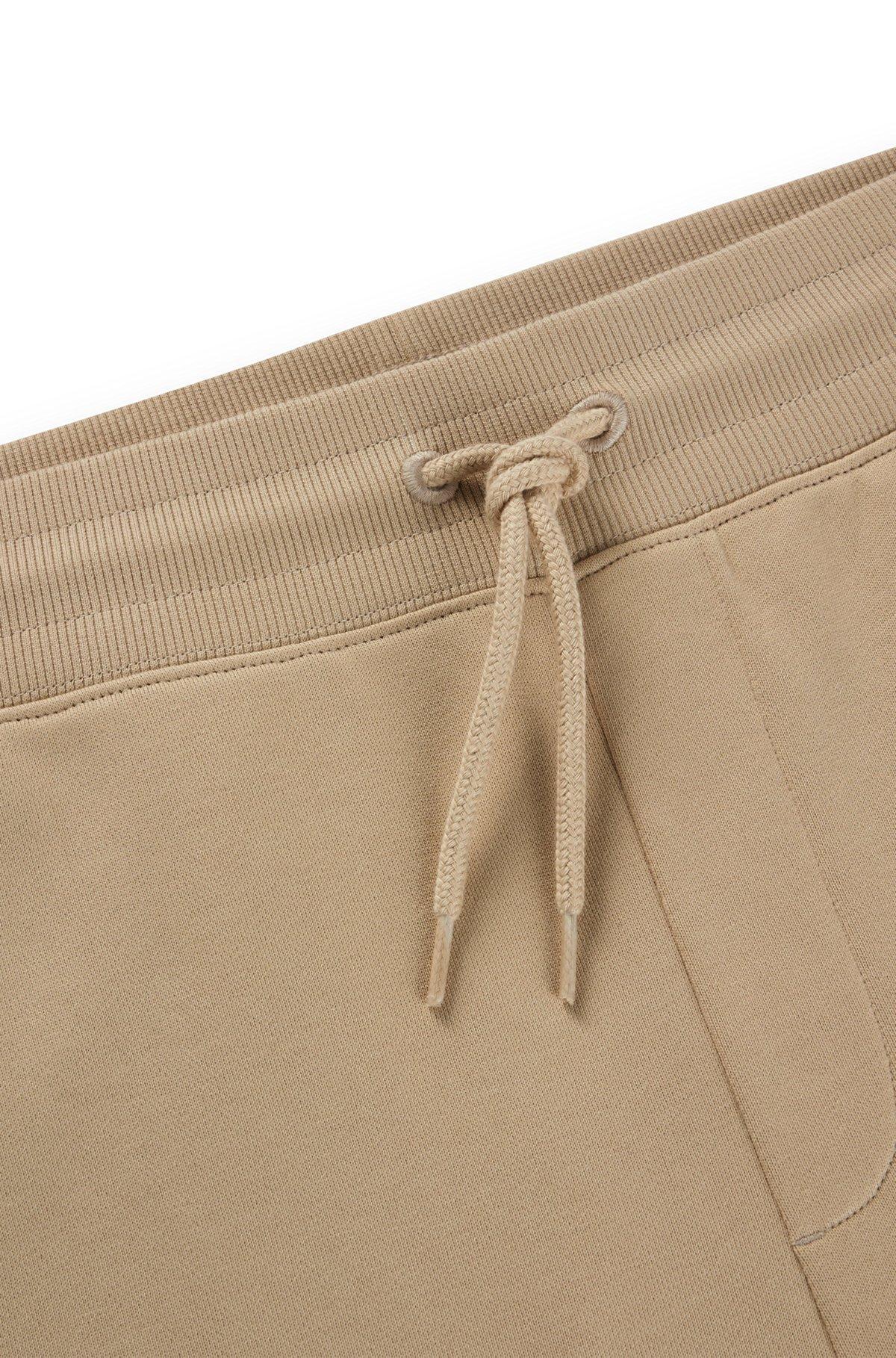 Cotton-terry relaxed-fit shorts with logo trim Product Image