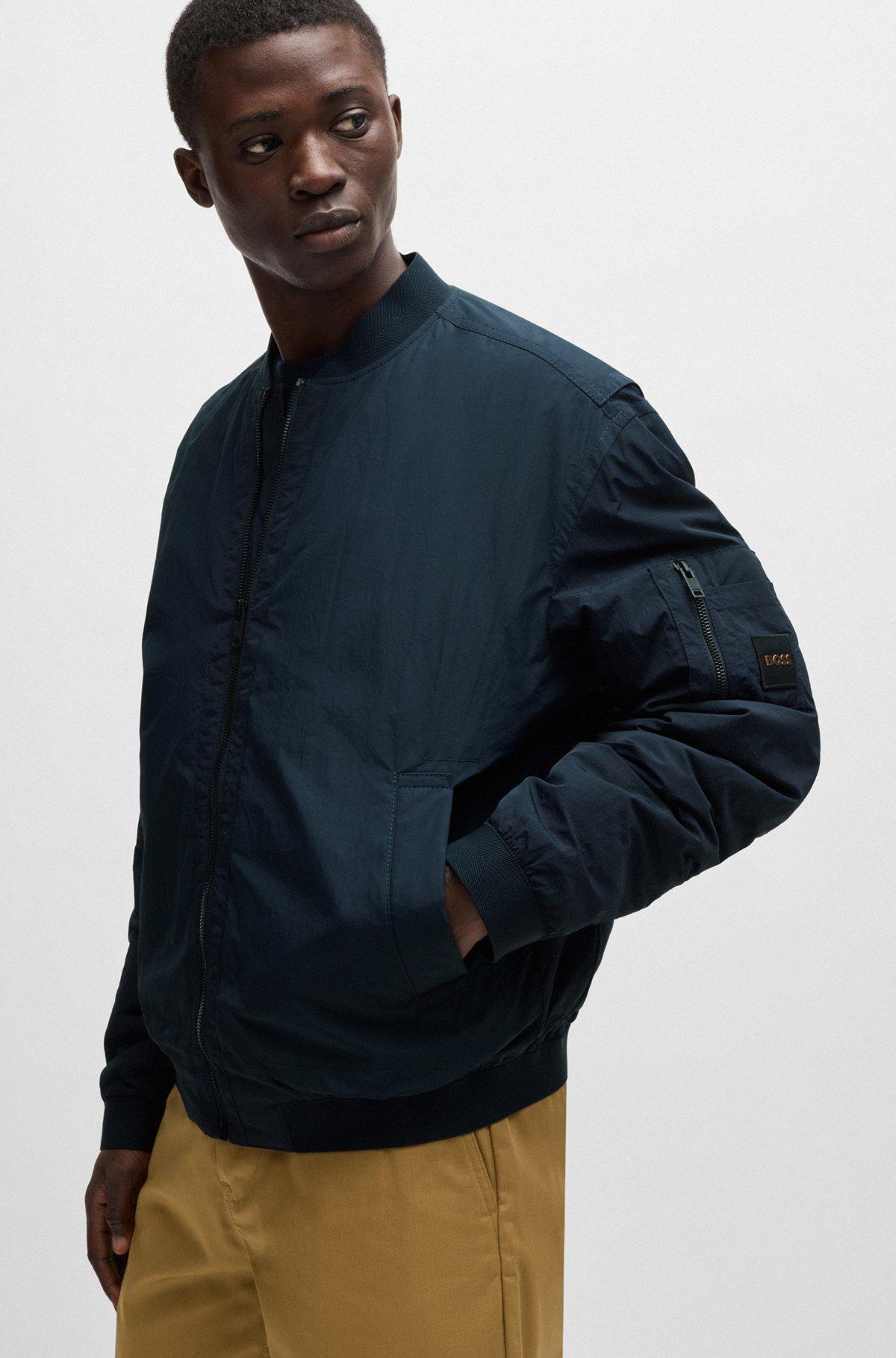 BOSS - Water-repellent bomber jacket with logo badge - Dark Blue Product Image