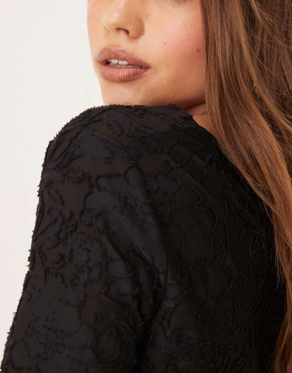 Gina Tricot jersey jacquard off shoulder top with asymmetric hem in black Product Image