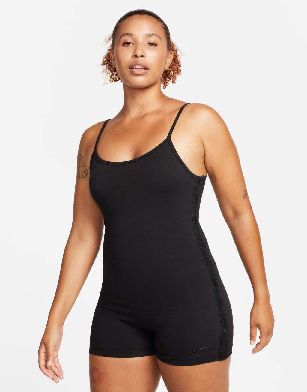 Nike one piece jumpsuit with tape detail Product Image