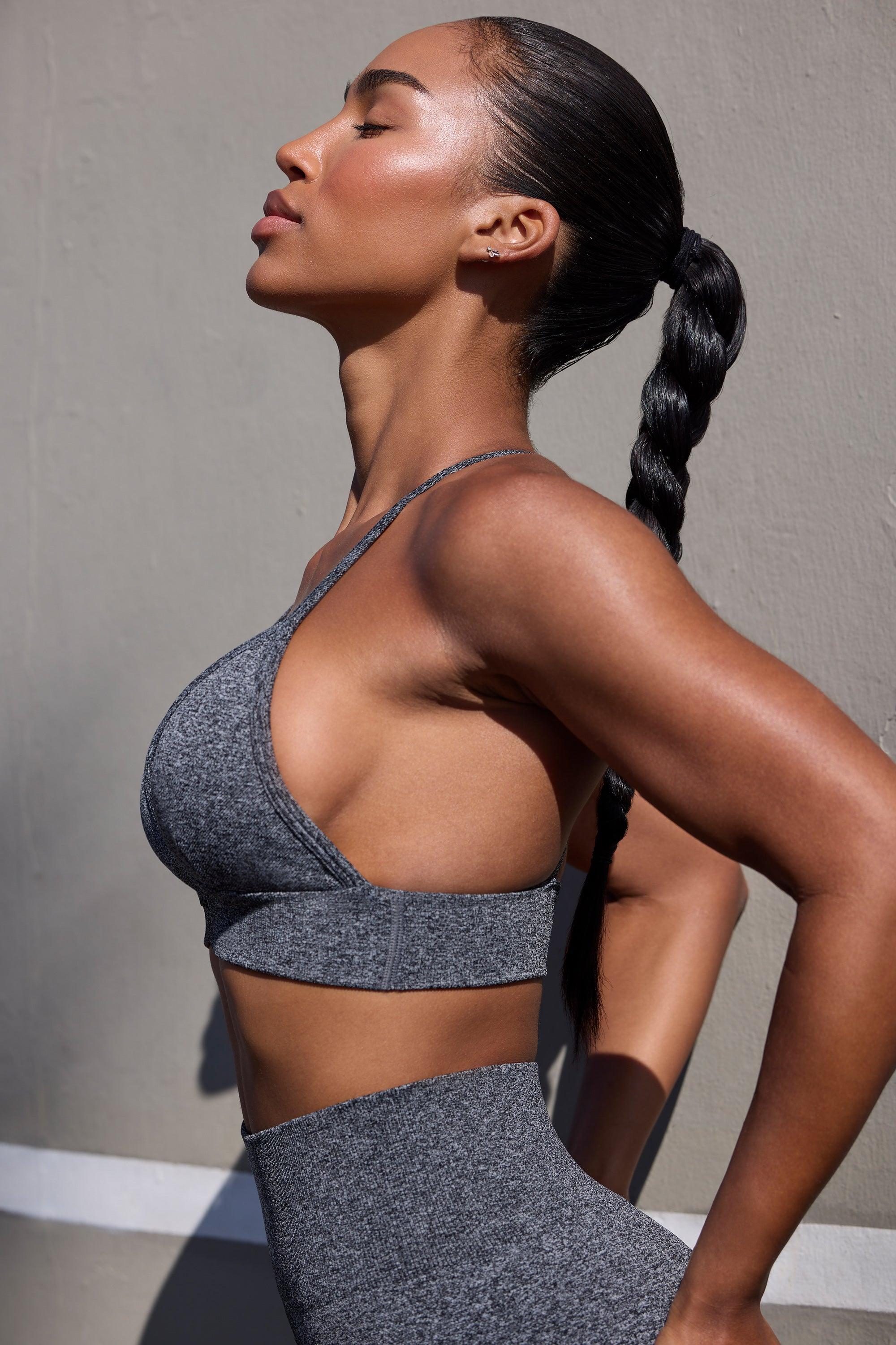 Super Sculpt Seamless Triangle Sports Bra in Marl Black Female Product Image