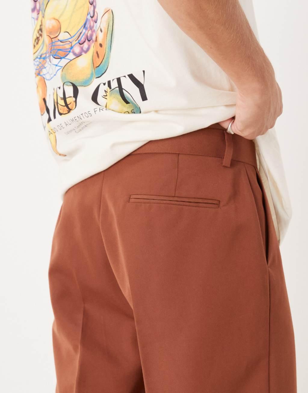 ASOS DESIGN oversized tapered dress pants with front pleat in rust Product Image