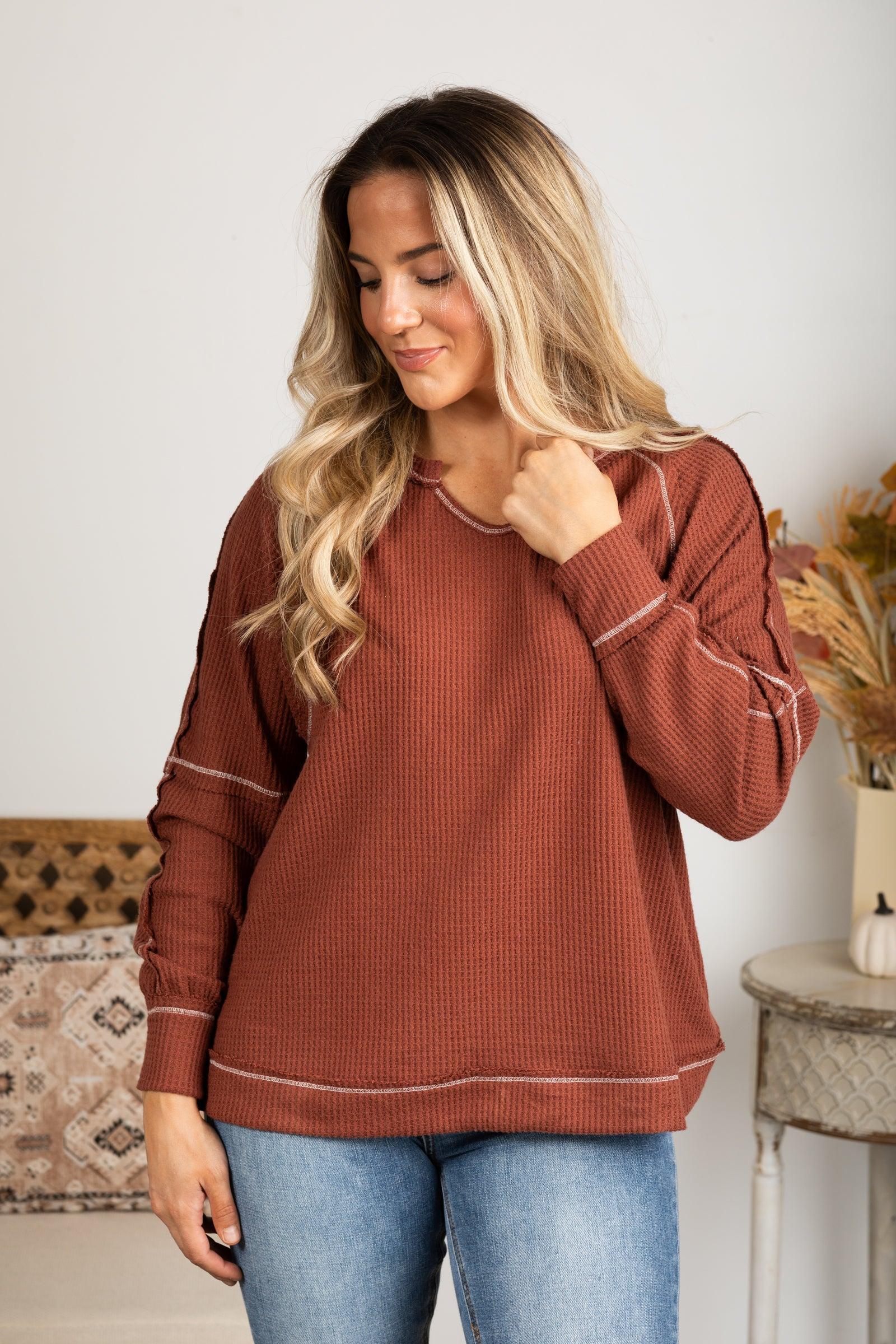 Notched Neck With Exposed Seams Knit Top Product Image