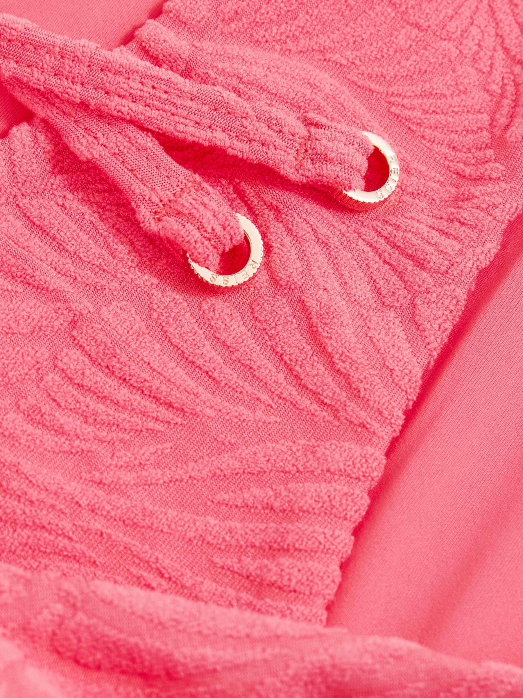 Textured Side-Tie Bikini Bottoms in Coral Pink Product Image