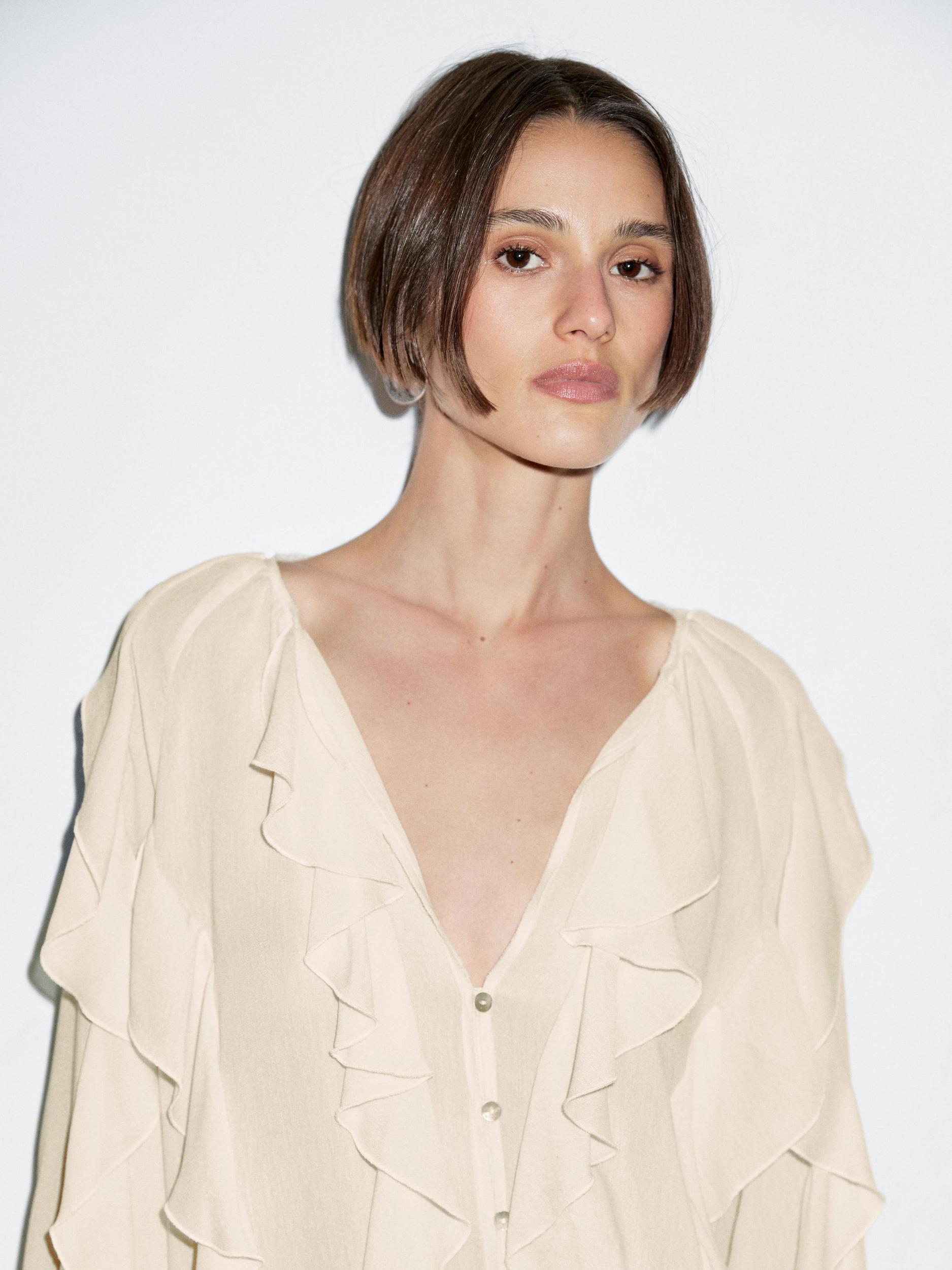 Flowing blouse with ruffles Product Image