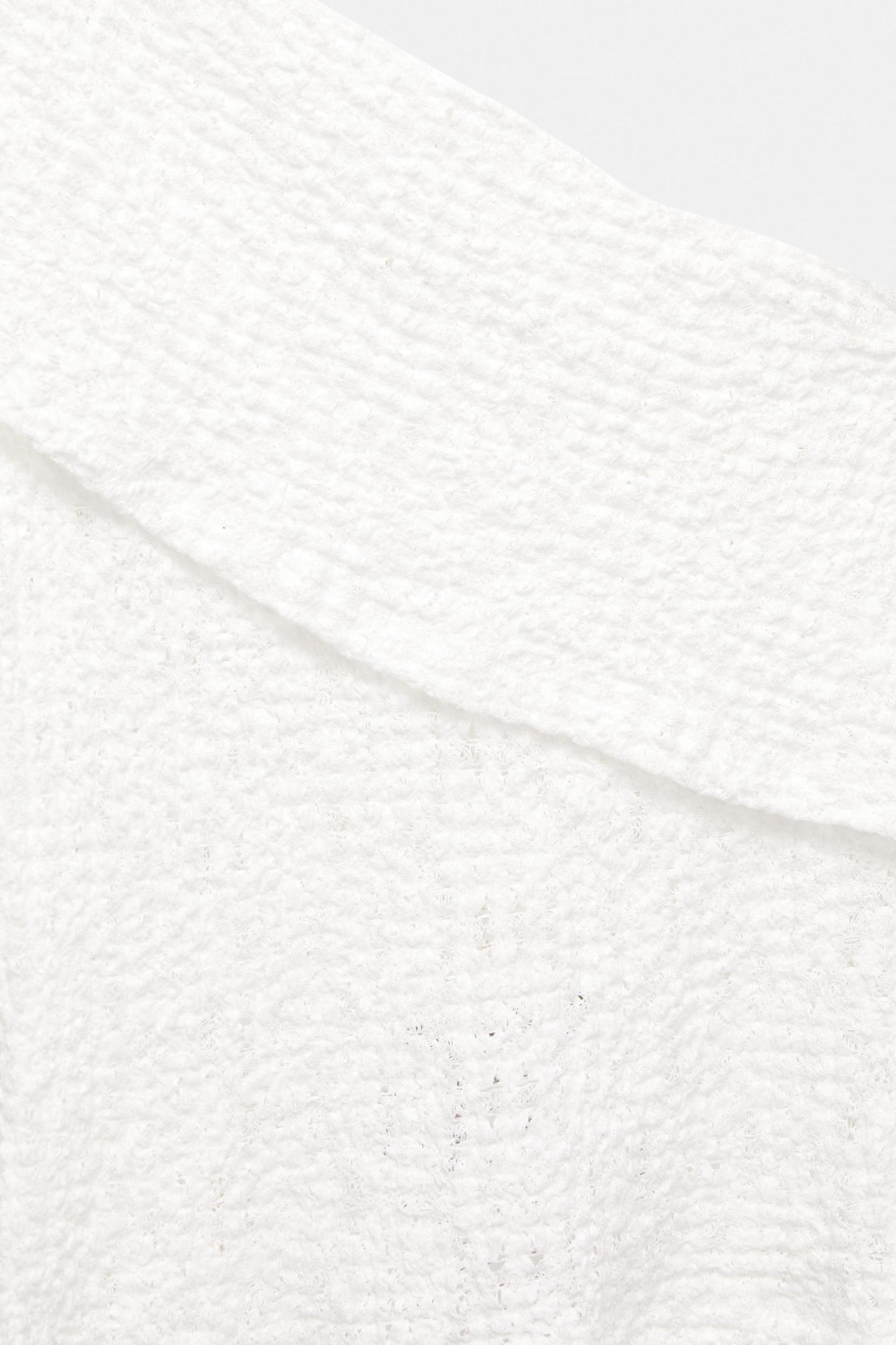 Asymmetric openwork top Product Image